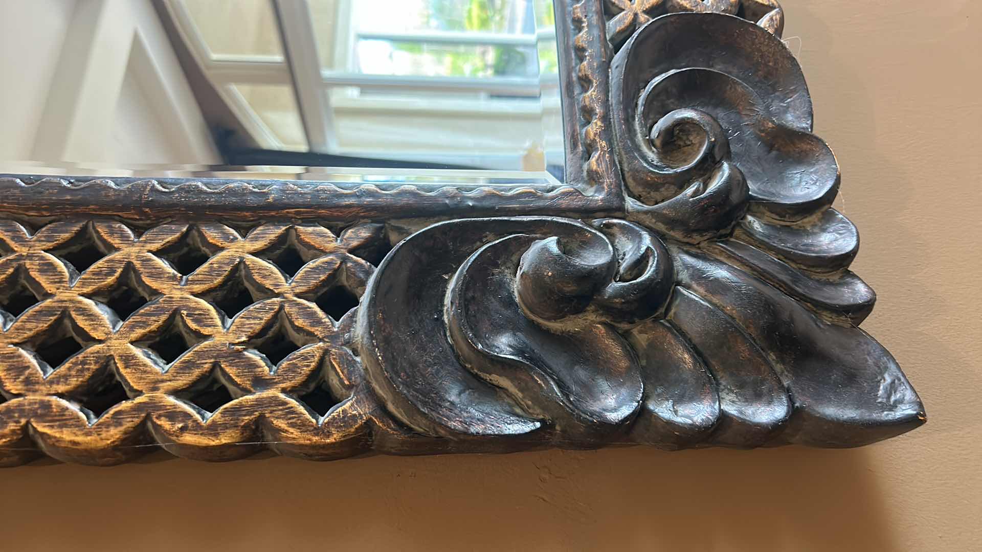 Photo 2 of ORNATELY FRAMED BEVELED GLASS MIRROR 
35” x 46”