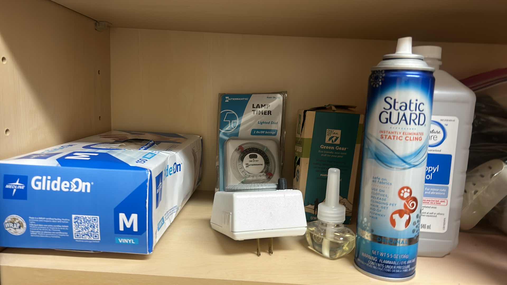 Photo 1 of CONTENTS OF CABINET IN LAUNDRY ROOM