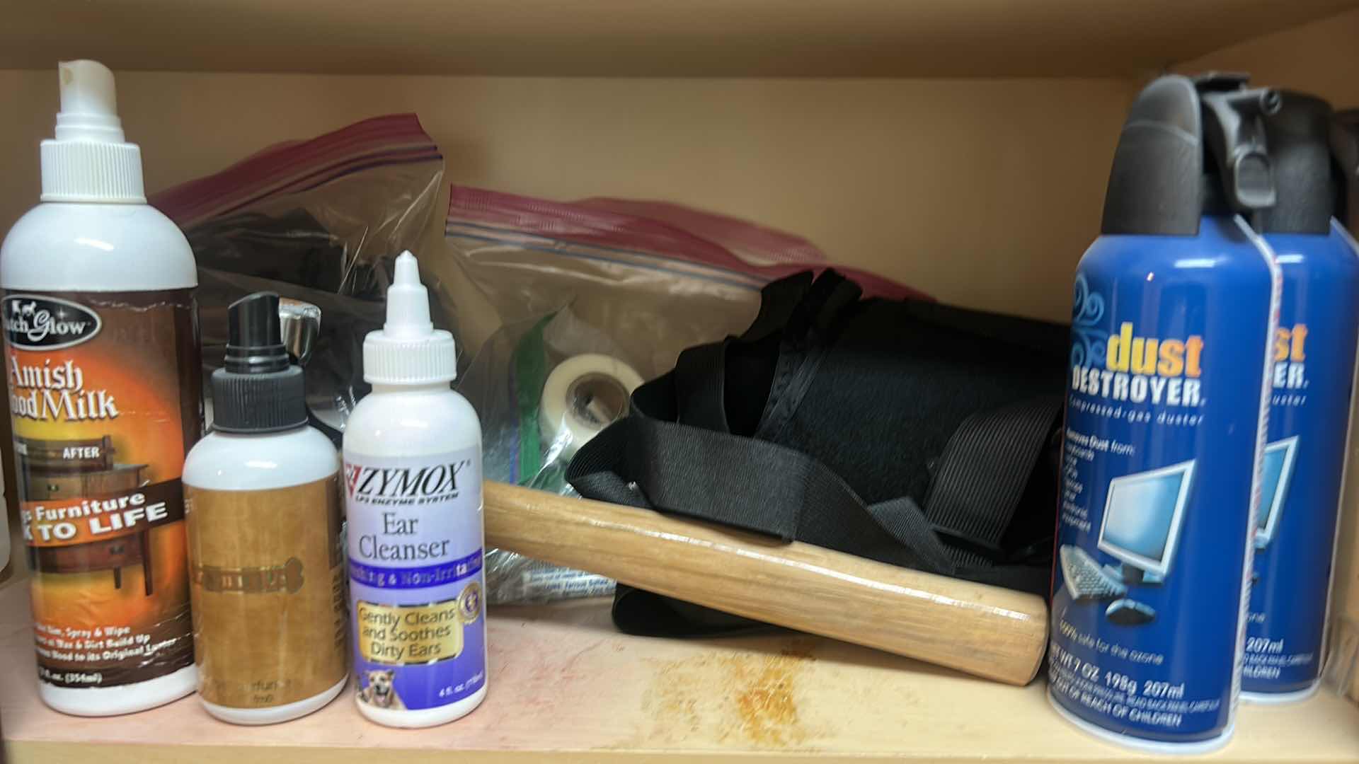 Photo 1 of CONTENTS OF CABINET IN LAUNDRY ROOM