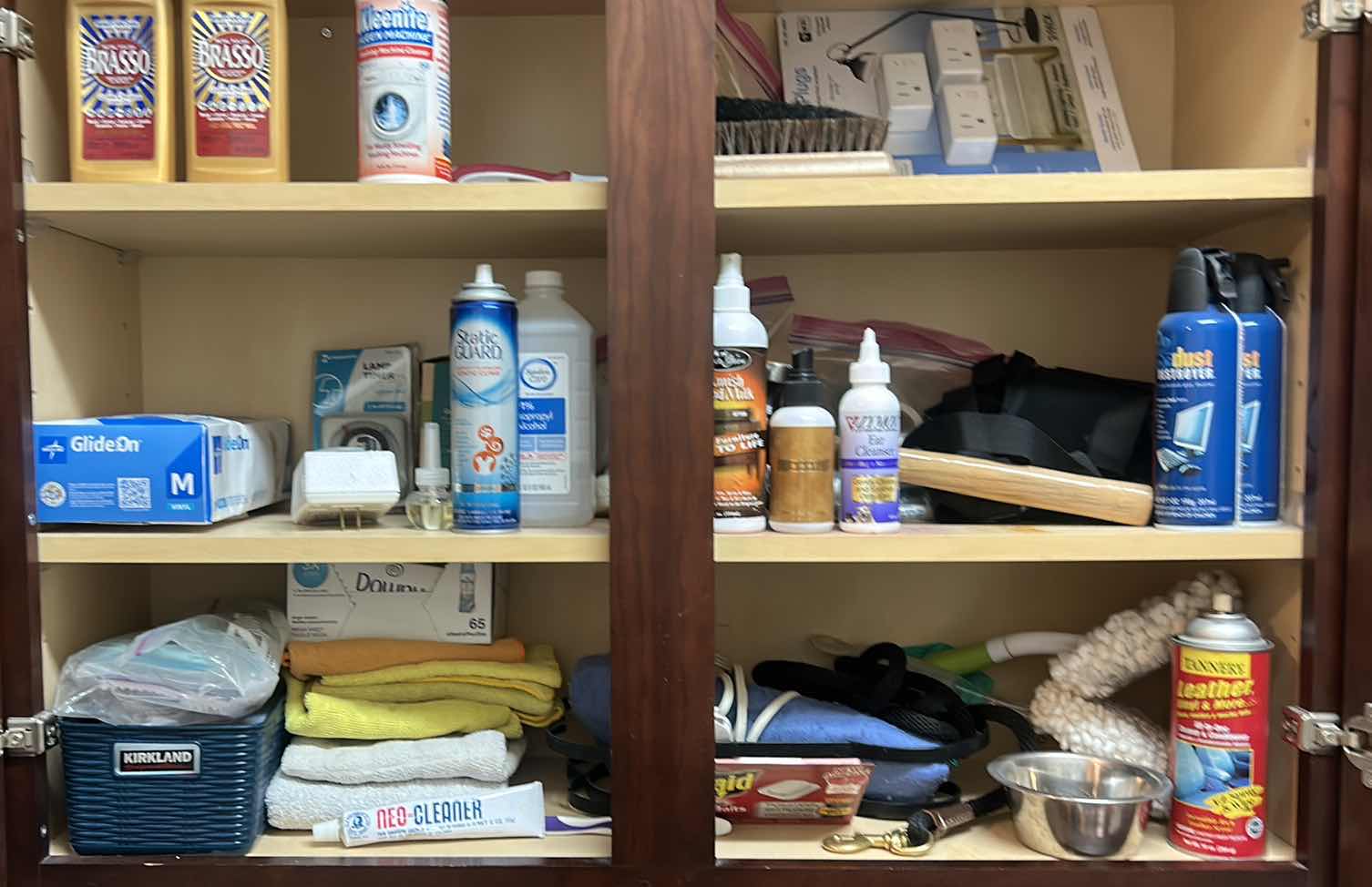 Photo 1 of CONTENTS OF CABINET IN LAUNDRY ROOM