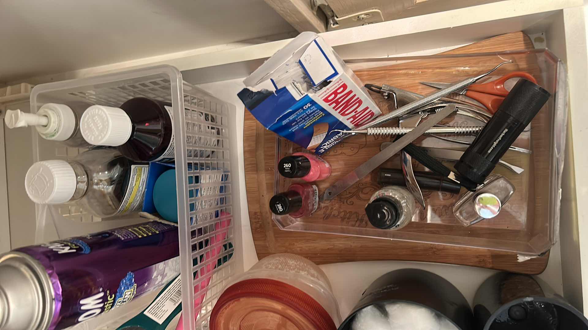 Photo 1 of CONTENTS OF BATHROOM CABINET