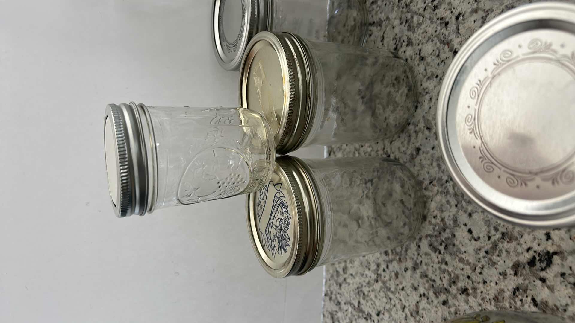 Photo 1 of CANNING JARS AND CANNISTERS