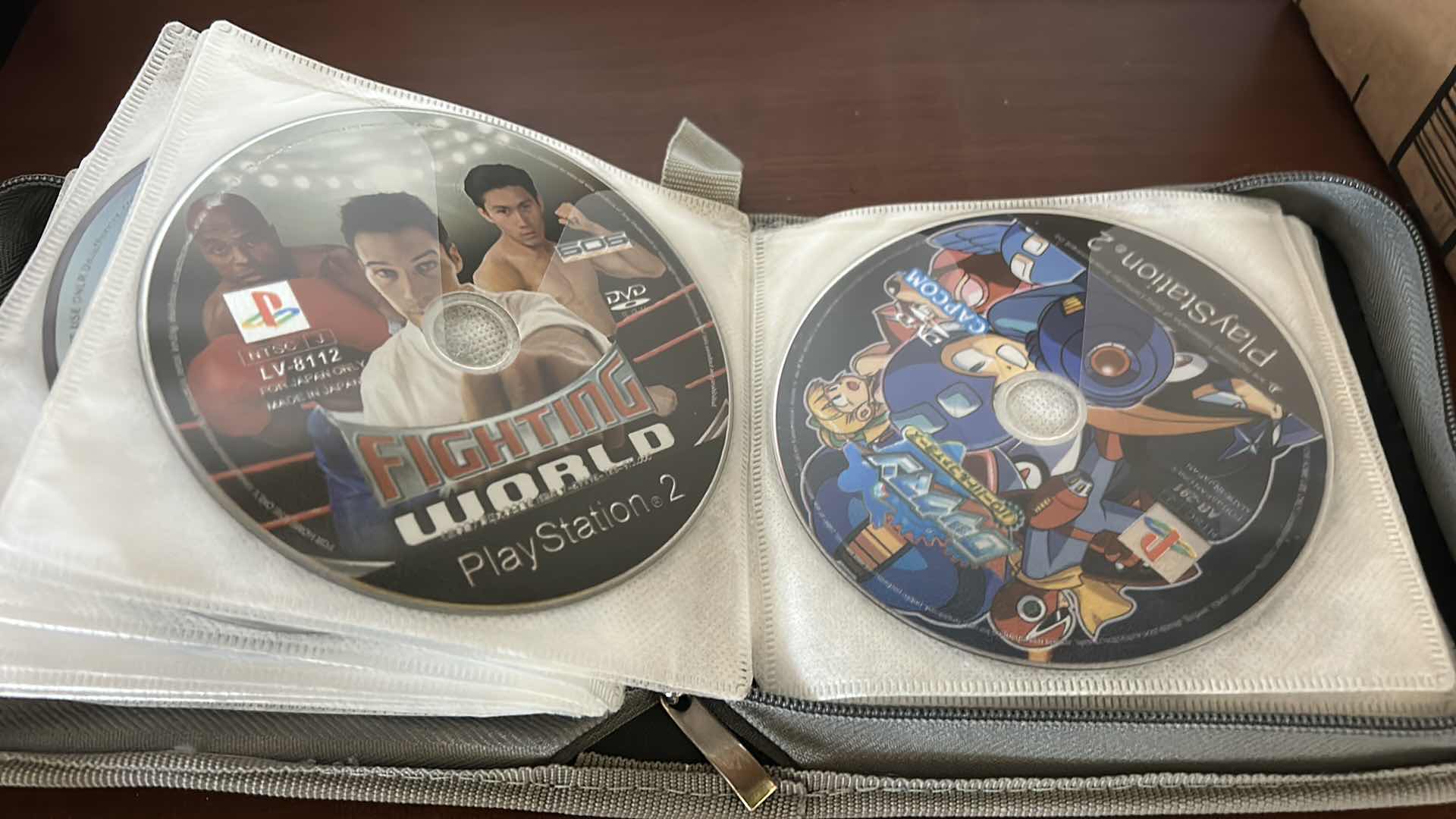 Photo 1 of 37 PLAY STATION 2 GAMES AND 2 SONY PLAYSTATION CONTROLLERS