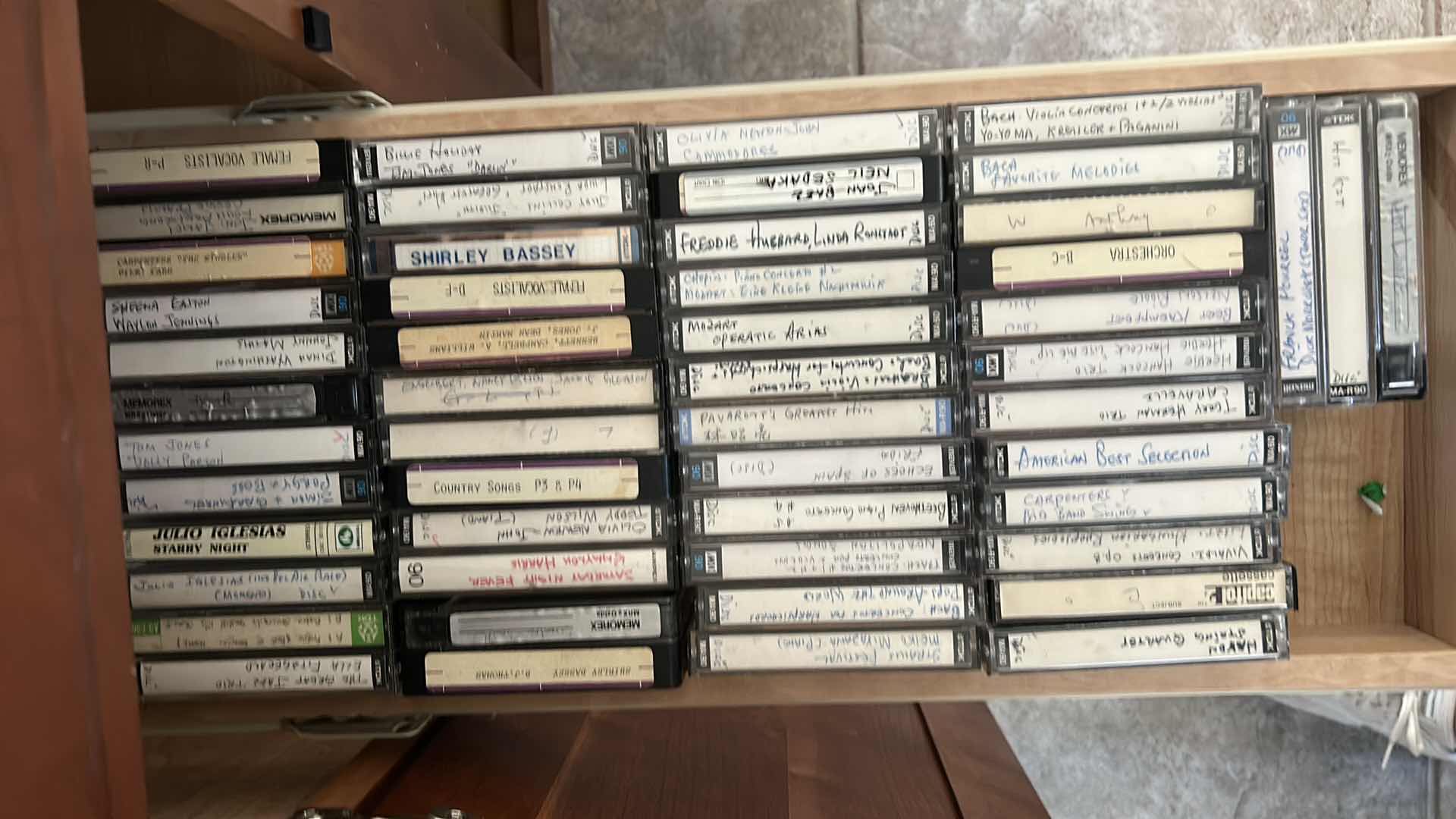 Photo 1 of 2 ROWS OF CASSETTE TAPES