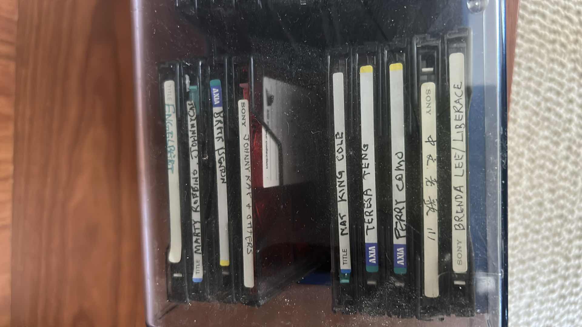 Photo 1 of CONTENTS CABINET- MUSIC CASSETTES & SONY DISCS