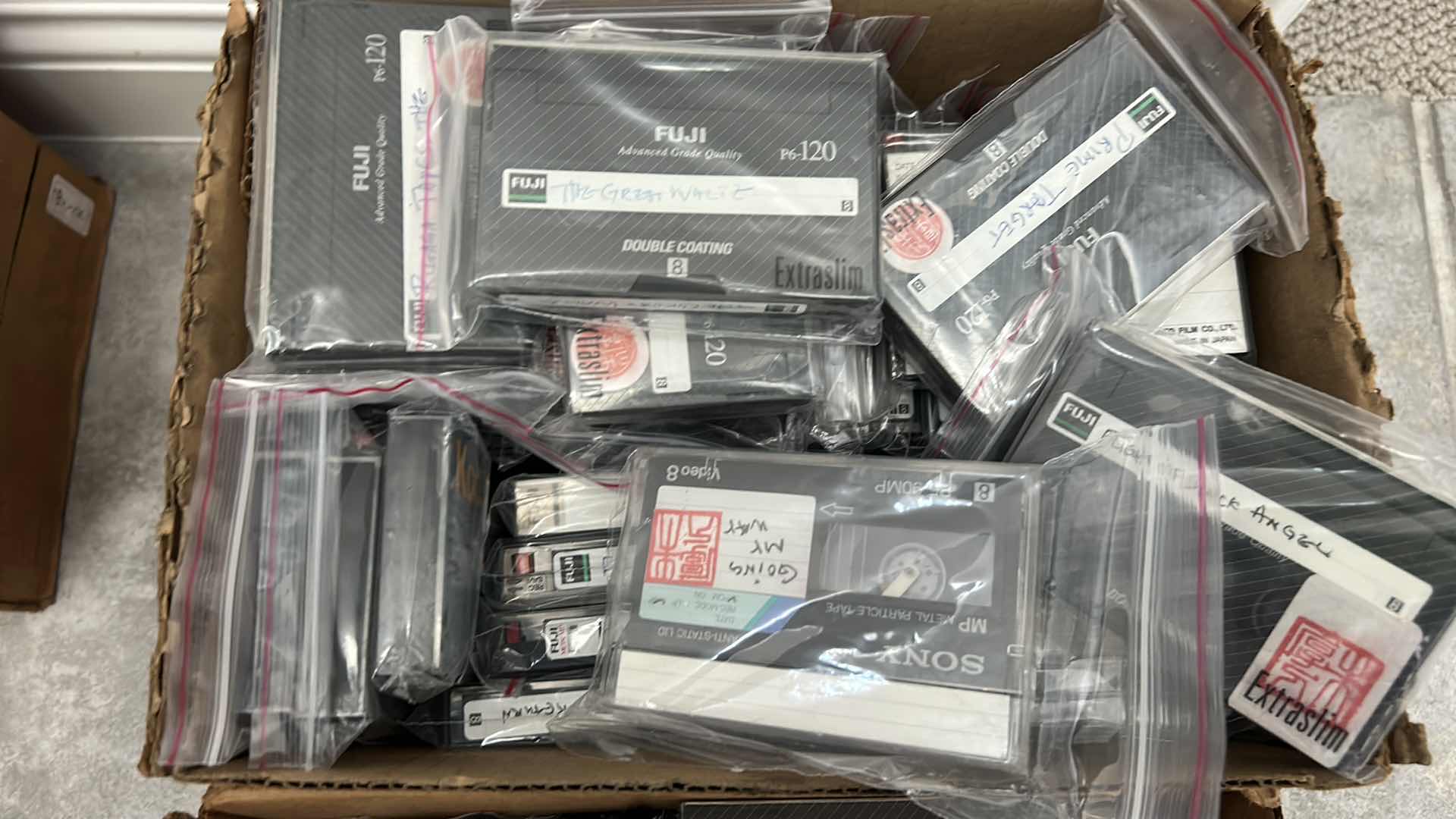 Photo 1 of 2 BOXES OF MOVIES ON CASSETTE