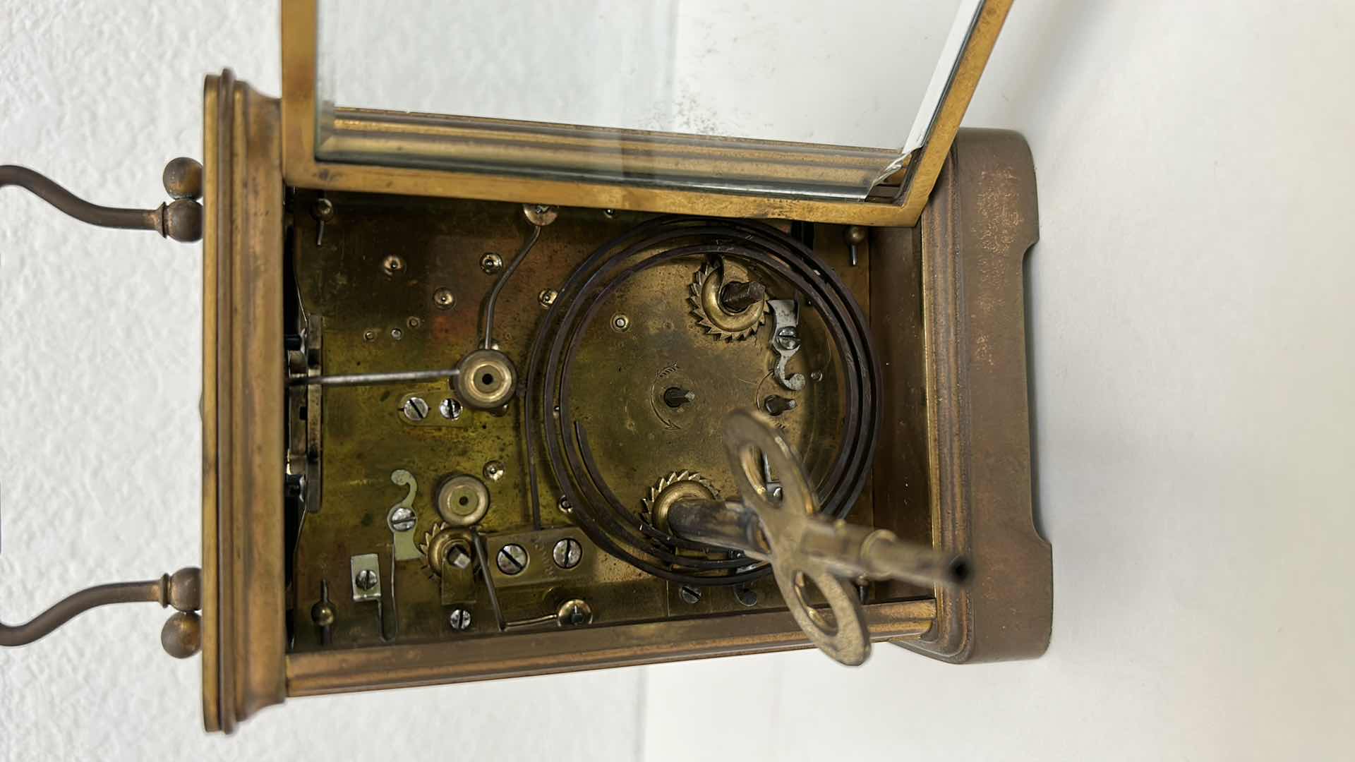 Photo 1 of ANTIQUE BRASS CHIMING CLOCK H5”