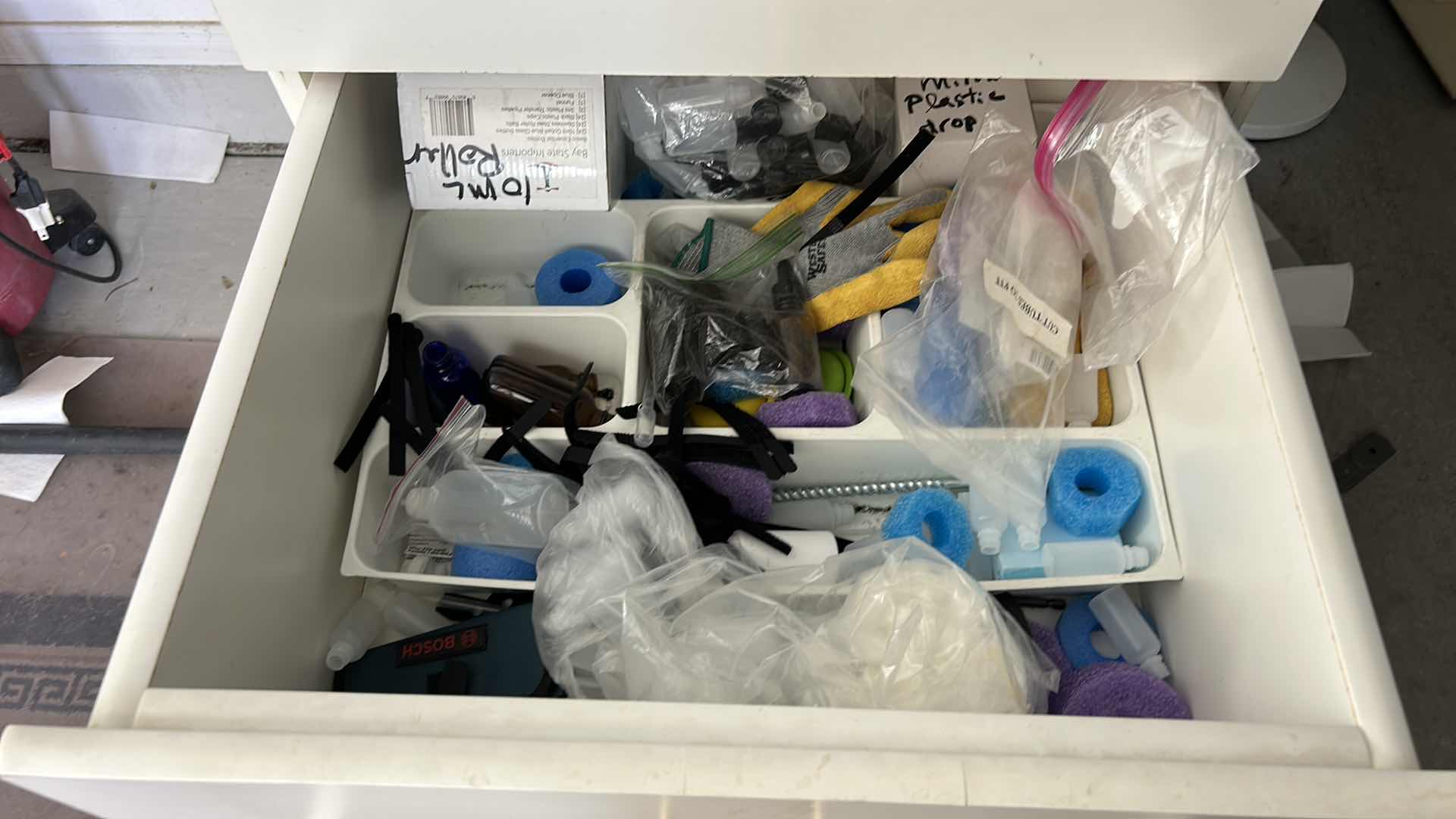 Photo 1 of 3 PULL OUT DRAWERS IN GARAGE- MOSTLY BOTTLING SUPPLIES