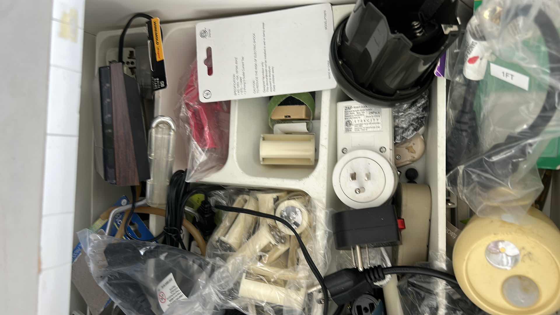 Photo 1 of CONTENTS OF PULL OUT DRAWER IN GARAGE