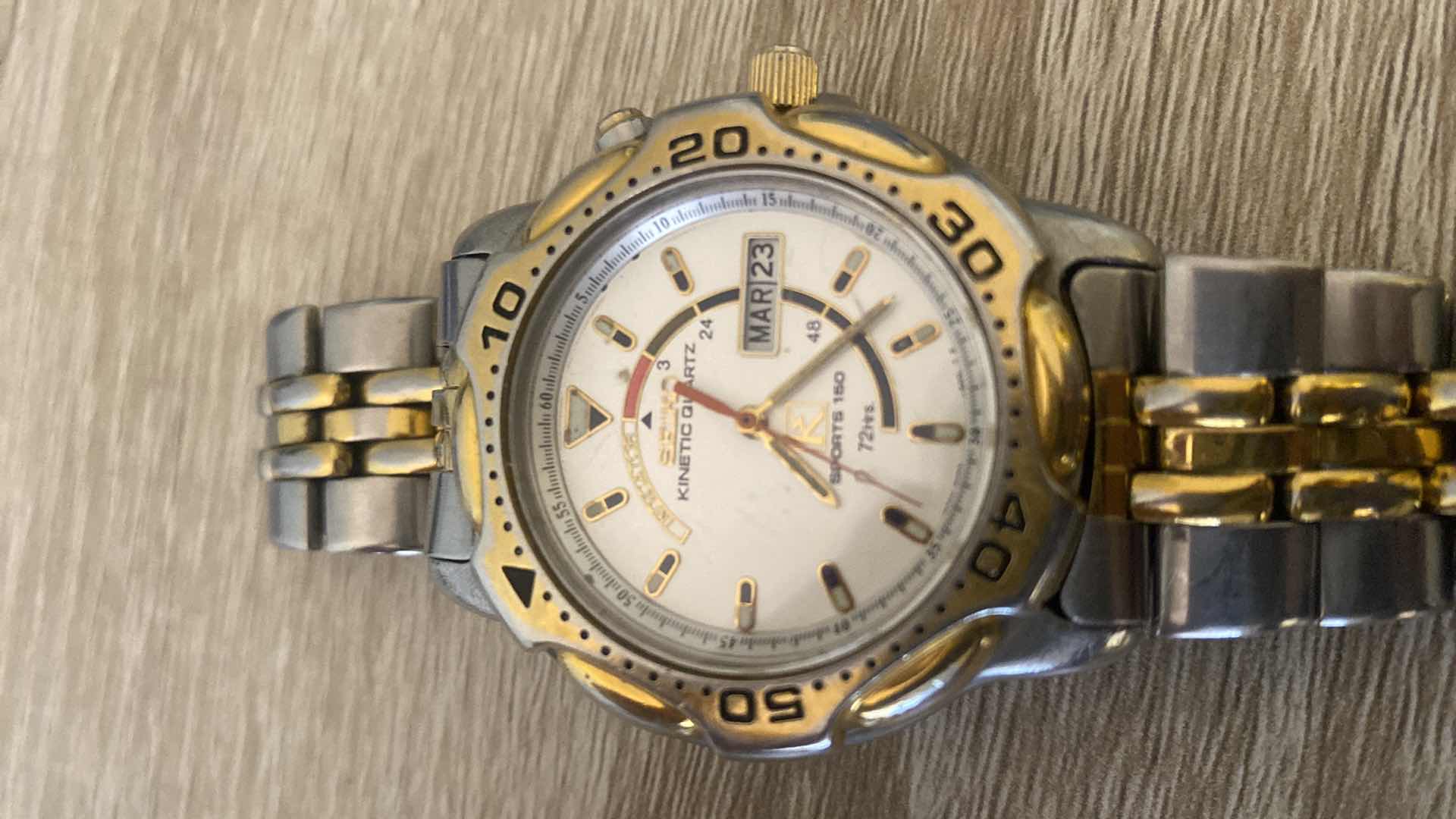 Photo 1 of MENS SEIKO KINETIC QUARTZ 150M WATER RESISTANT WATCH