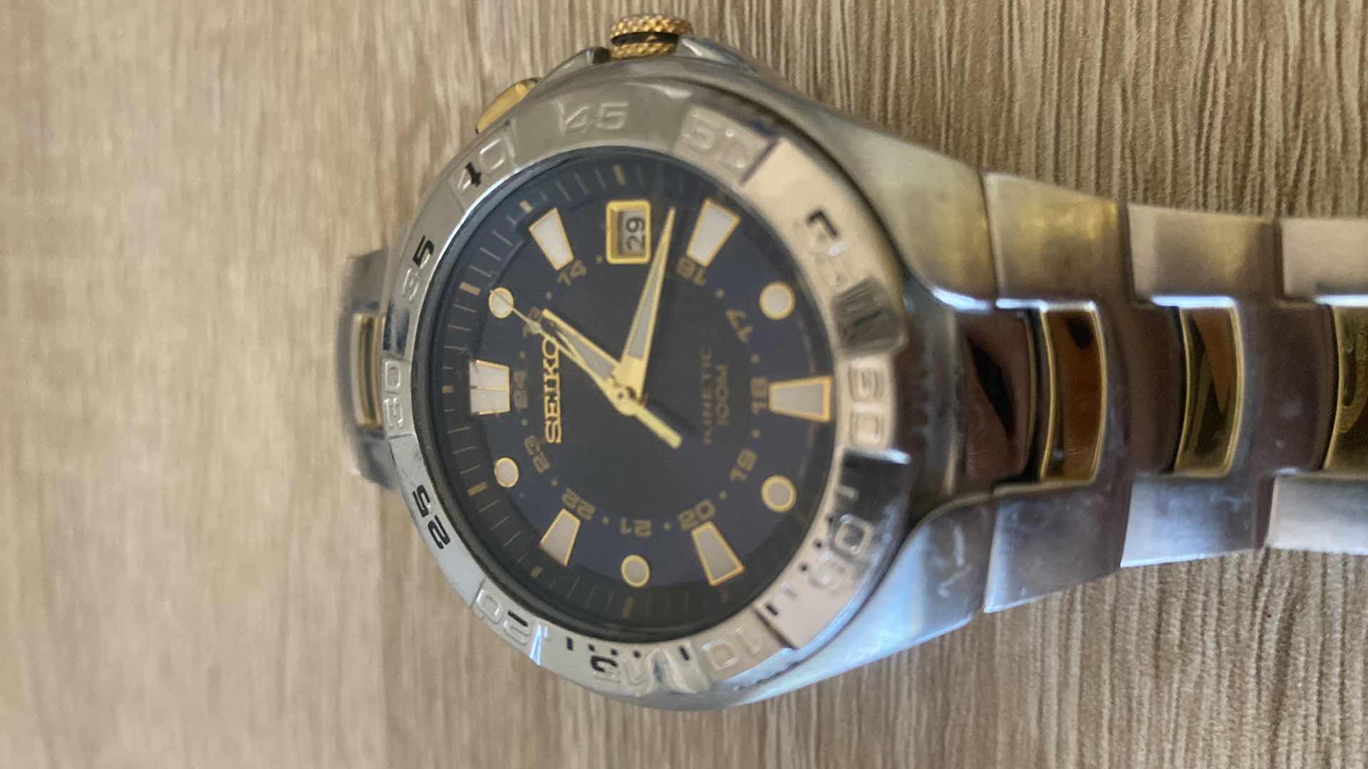 Photo 1 of SEIKO KINETIC 100M WATER-RESISTANT MENS WATCH