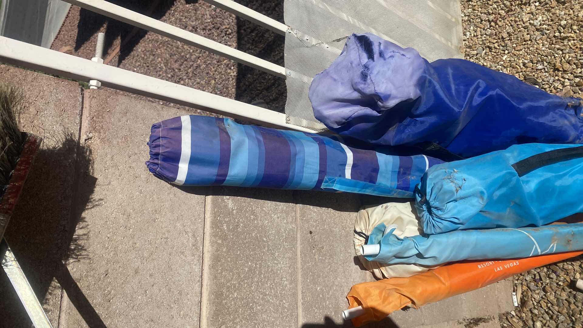 Photo 1 of FOLDING CHAIRS AND UMBRELLAS - CONDITION UNKNOWN