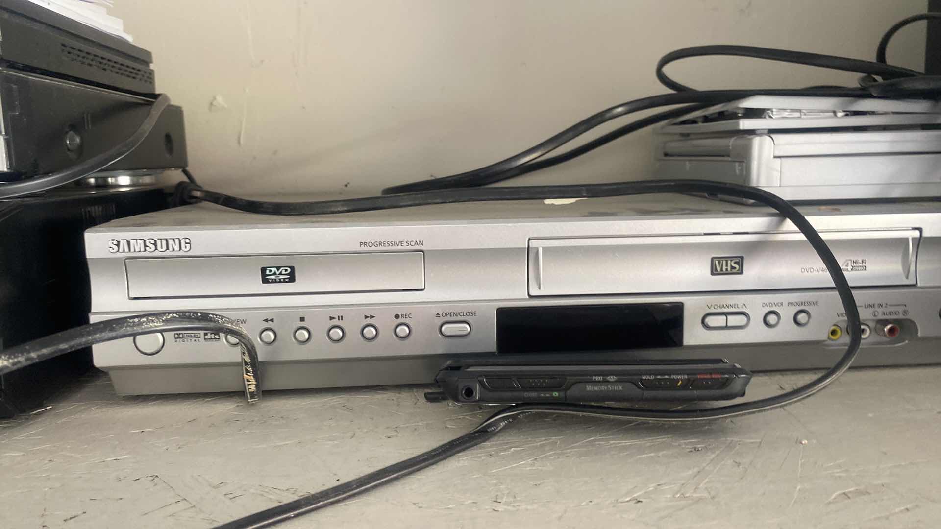 Photo 1 of GARAGE SHELF - ELECTRONICS ITEMS - UNKNOWN CONDITION