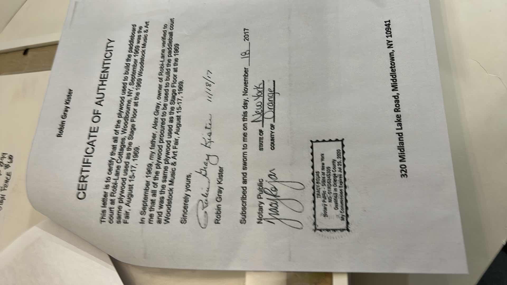 Photo 1 of AUTHENTIC WOODSTOCK FESTIVAL 1969 MEMORABILIA IN ORIGINAL DESIGNED SHADOW BOX. 12“ x 15“INCLUDES WOODSTOCK TICKET, PIECE OF THE GATE AND PIECE OF THE STAGE. GATE AND STAGE CRAFTED INTO PEACE SIGNS. DOCUMENTATION AND AUTHENTICITY PAPERS INCLUDED.