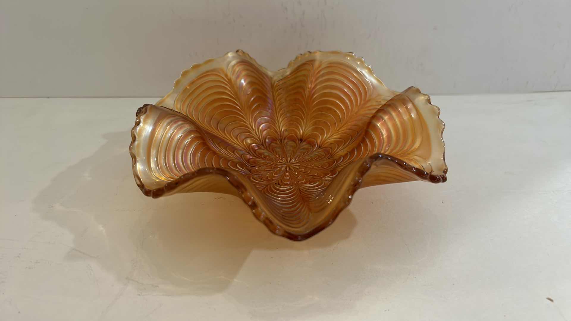 Photo 1 of VINTAGE CARNIVAL GLASS SCALLOPED BOWL 
7” x 2 1/4”