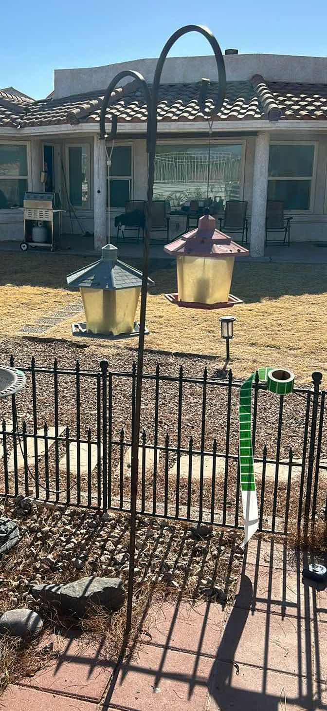 Photo 1 of 6’ METAL HANGER WITH 2 BIRD FEEDERS