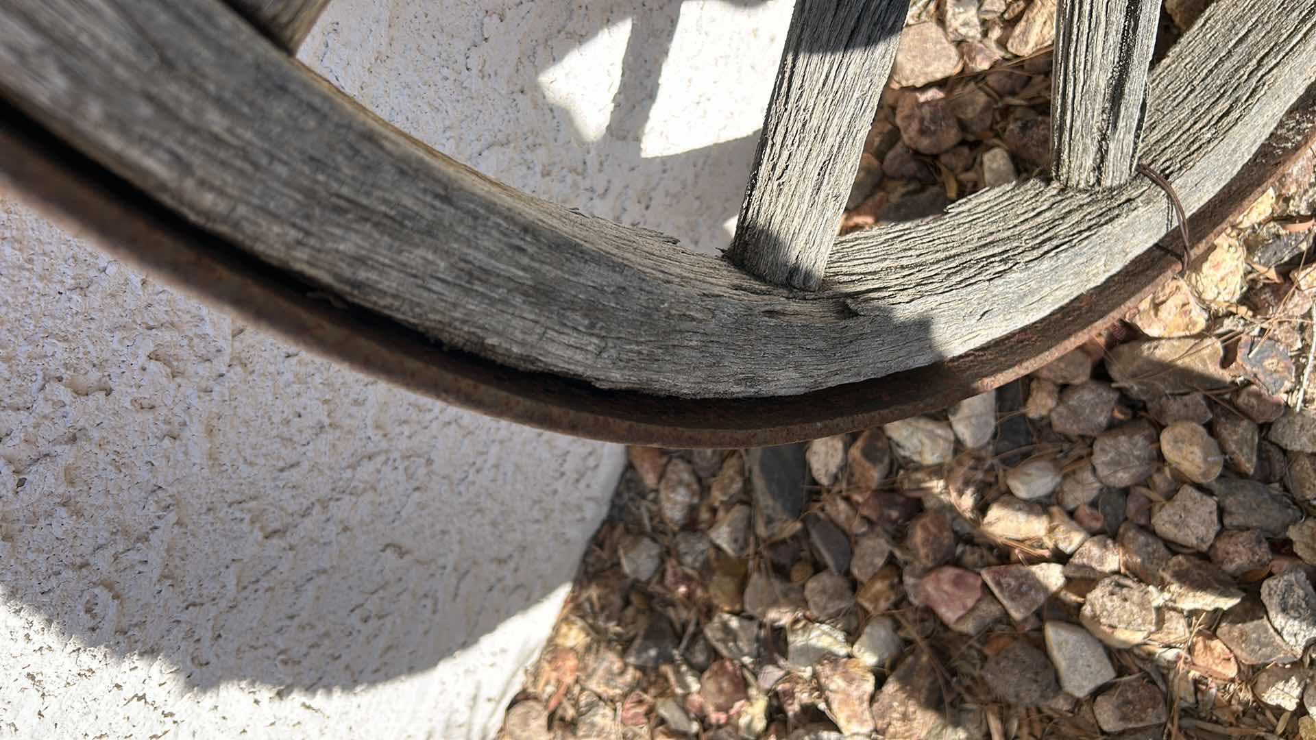 Photo 1 of ANTIQUE WOOD AND FORGED BRONZE WAGON WHEEL 3’