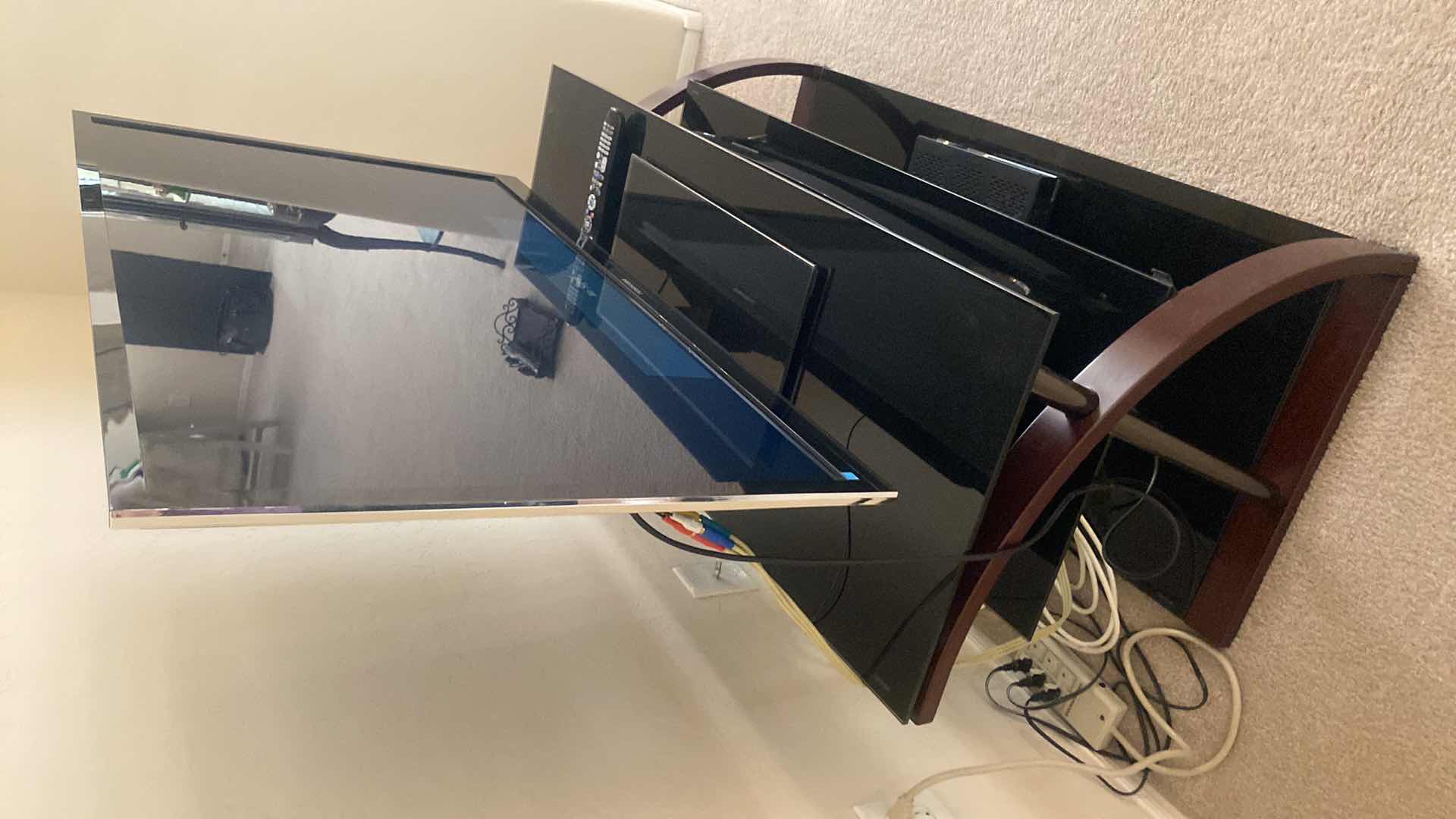 Photo 1 of TOSHIBA 46” TV WITH STAND AND YAMAHA SOUND BAR. INCLUDES COX REMOTE & TOSHIBA REMOTE STAND MEASURES 48” x 18” x 21 1/2”