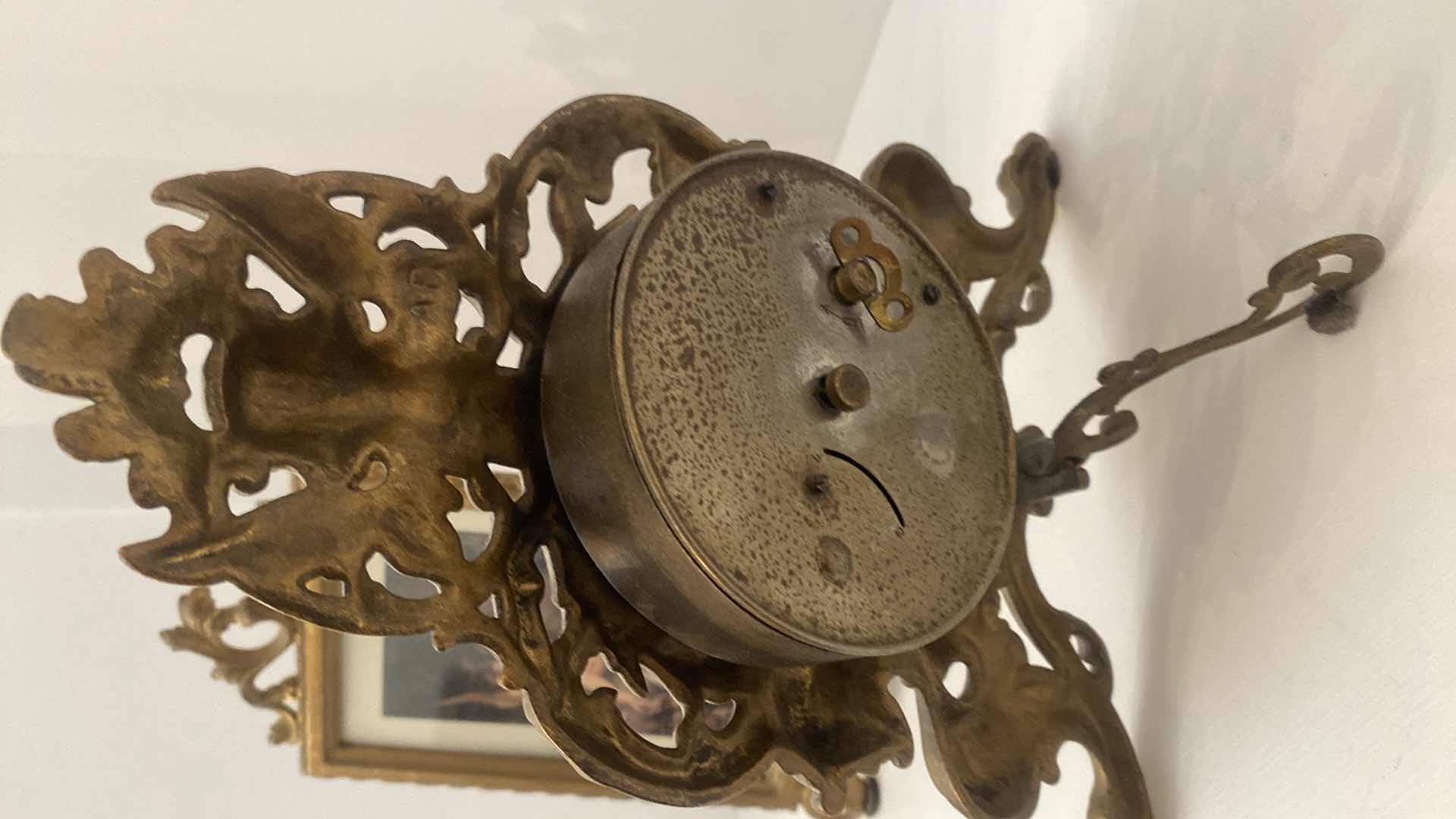 Photo 1 of BRASS PICTURE FRAME & BRASS WESTERN CLOCK CO MANTLE CLOCK 8 1/4” x 10 1/2”