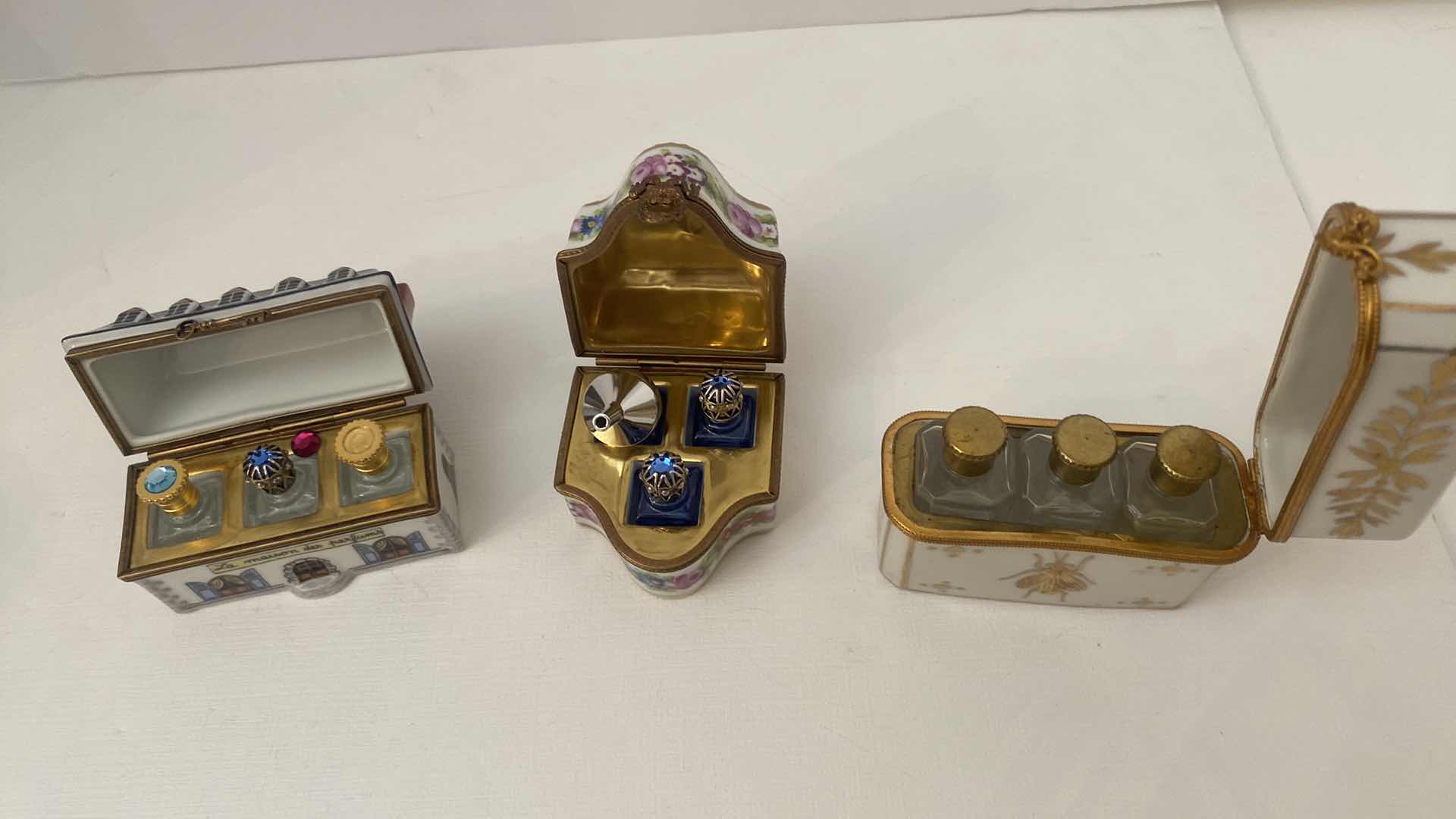 Photo 1 of LIMOGES WITH PERFUME BOTTLES LARGEST 3“ x 2 3/4”