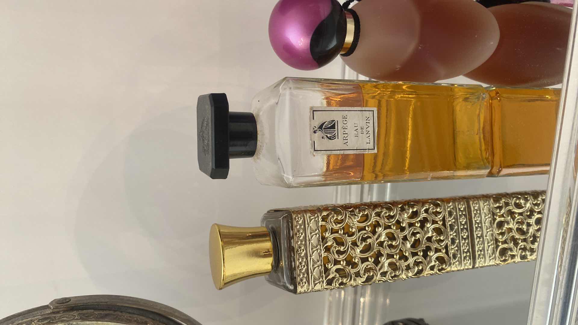 Photo 1 of GOLD VANITY ITEMS AND ASSORTED PERFUME