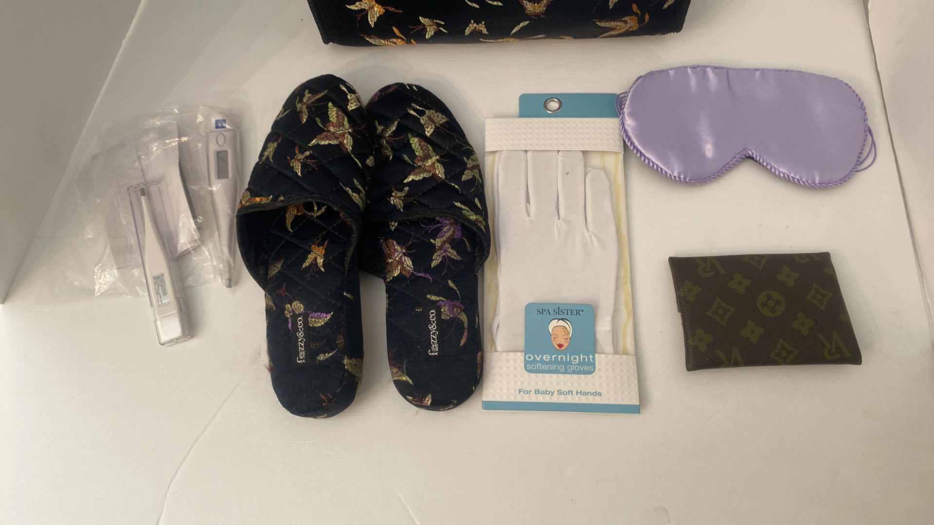 Photo 1 of LOUIS VUITTON UNAUTHENTICATED POCKET KLEENEX HOLDER & WOMENS CARE ASSORTMENT