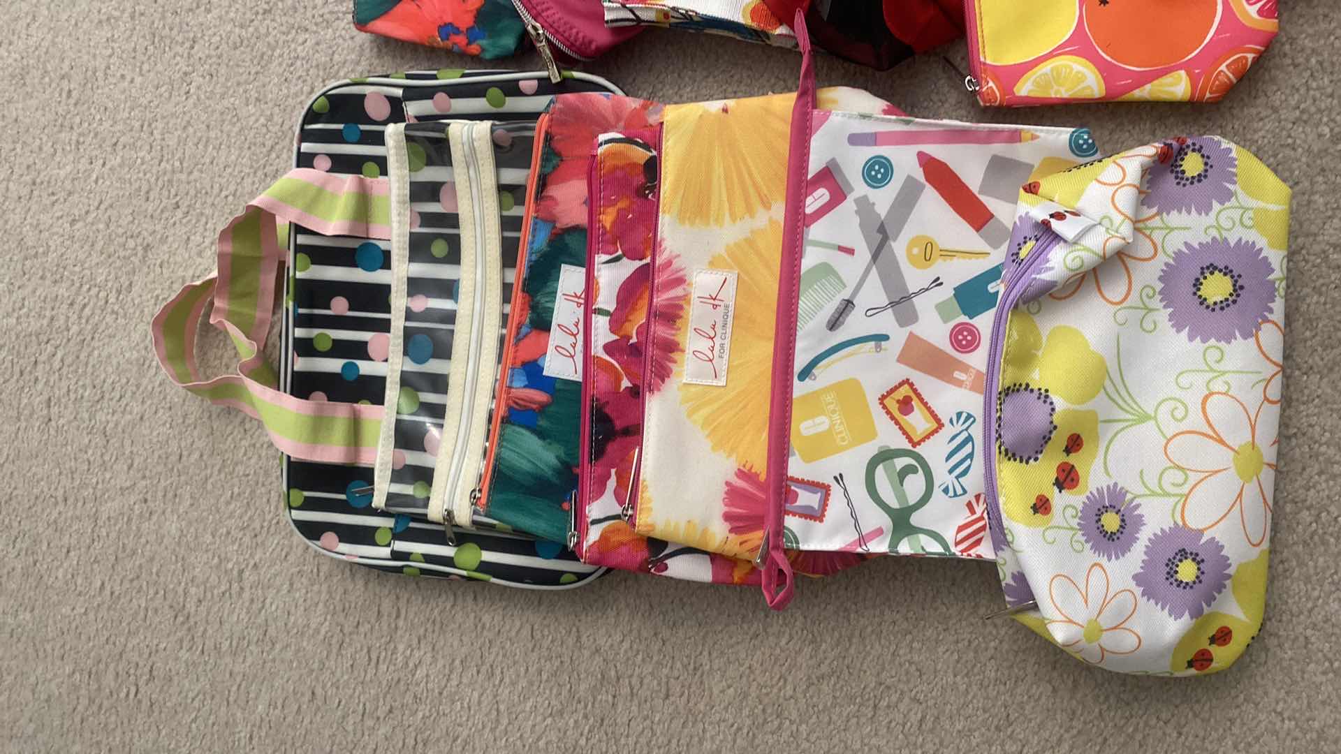 Photo 1 of COSMETIC BAG ASSORTMENT