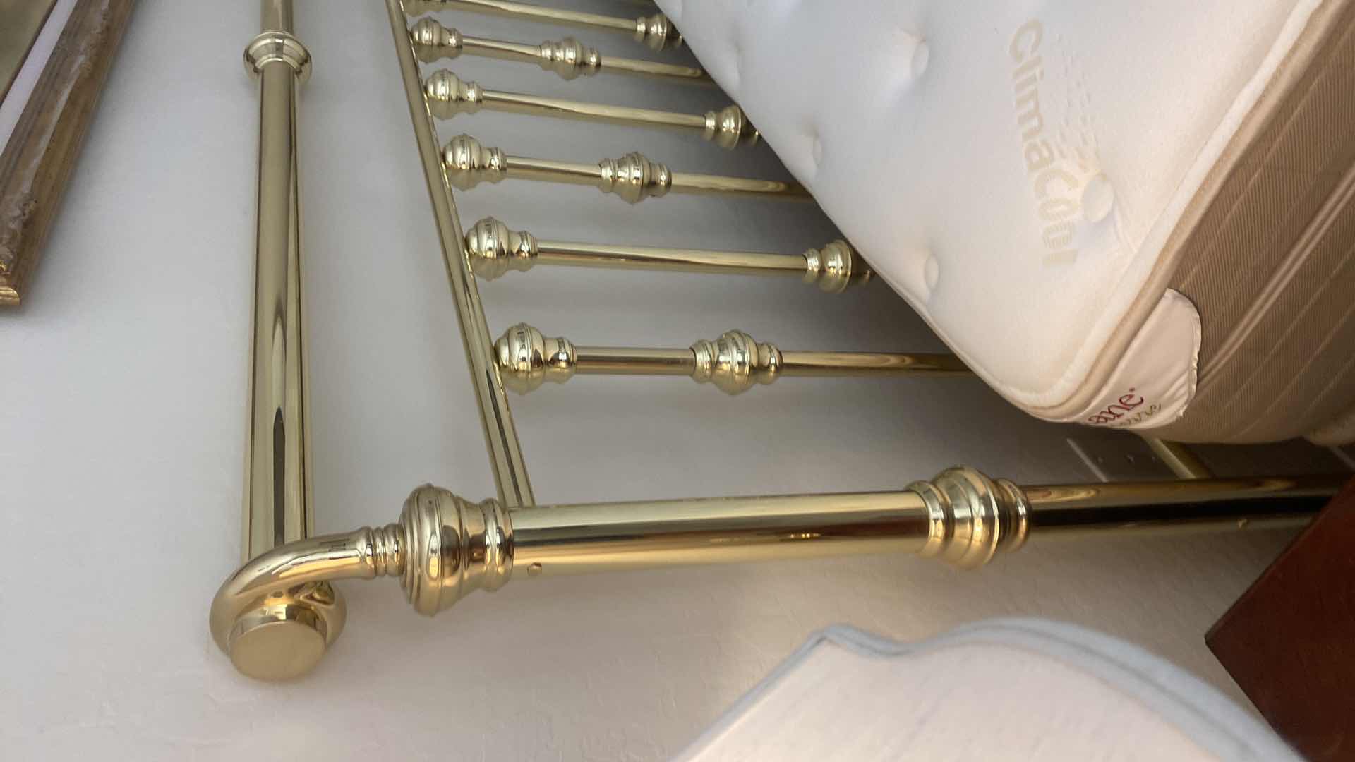 Photo 1 of KING SIZE BRASS HEADBOARD, INCLUDES STANDARD BEDFRAME HEADBOARD MEASURES 80” x 54” (mattress sold separately)