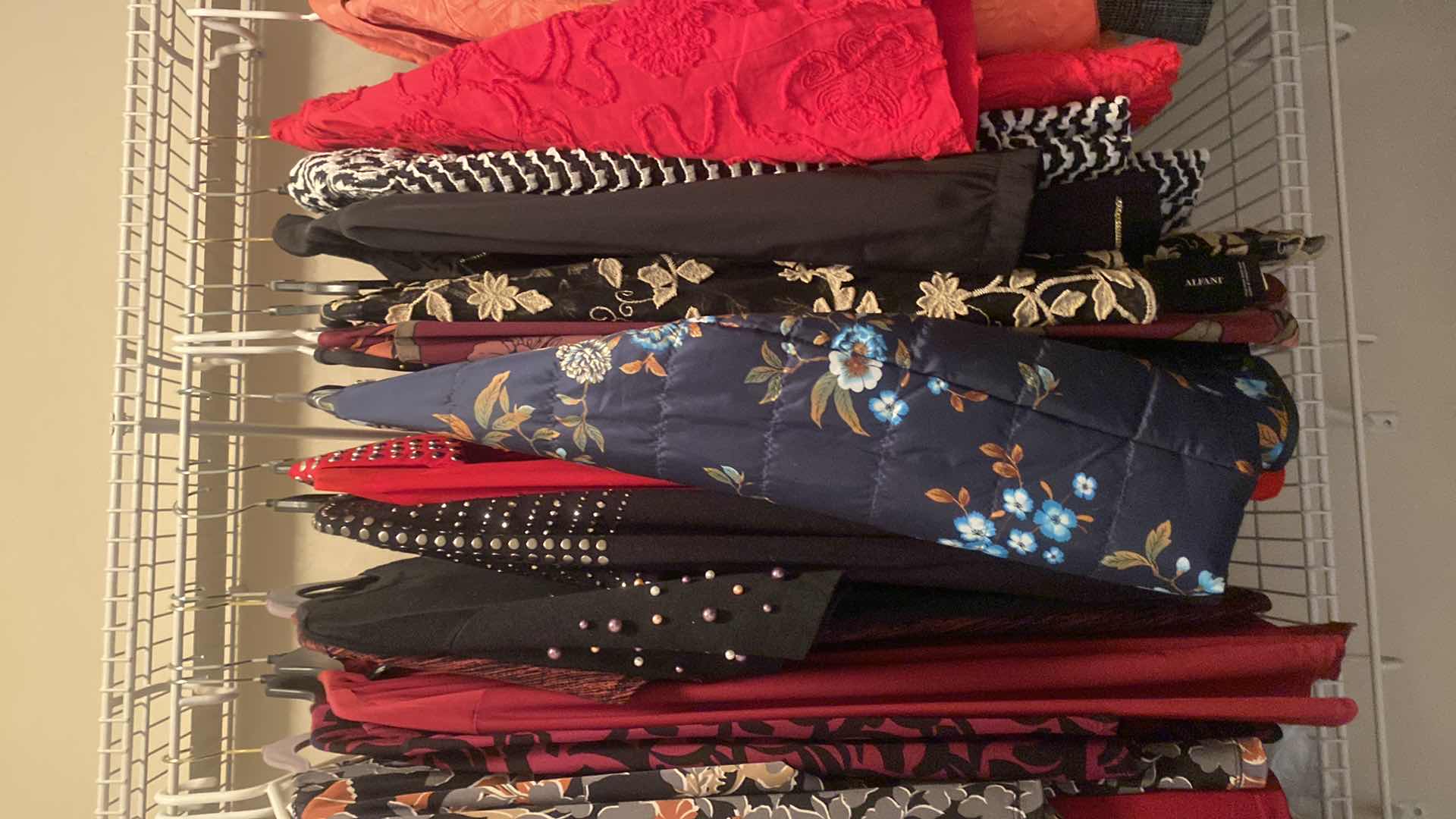 Photo 1 of WOMENS CLOTHING SIZE LARGE & MEDIUM - TOPS AND SWEATERS