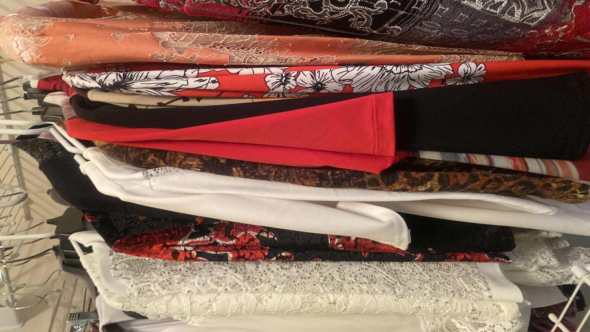 Photo 1 of WOMENS SIZE LARGE AND X-LARGE TOPS & JACKETS & SKIRTS