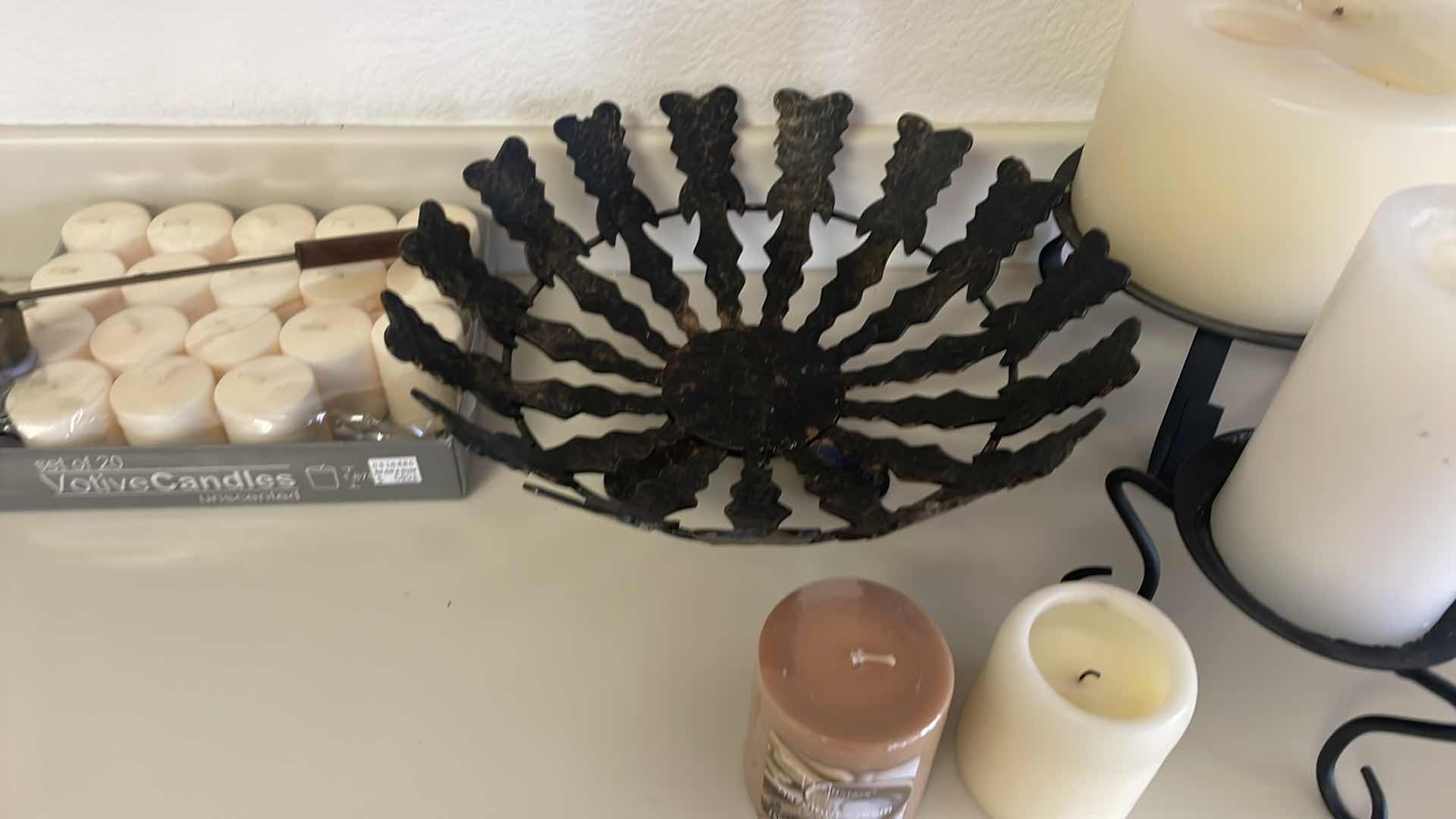 Photo 1 of CANDLE STANDS CAST IRON CANDLES AND VOTIVES