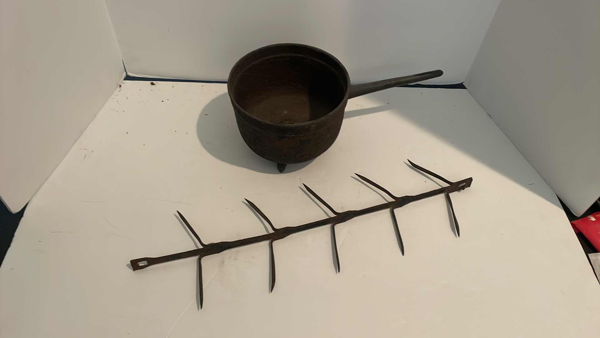 Photo 1 of ANTIQUE CAST IRON PAN 12”  AND HOOK 19”