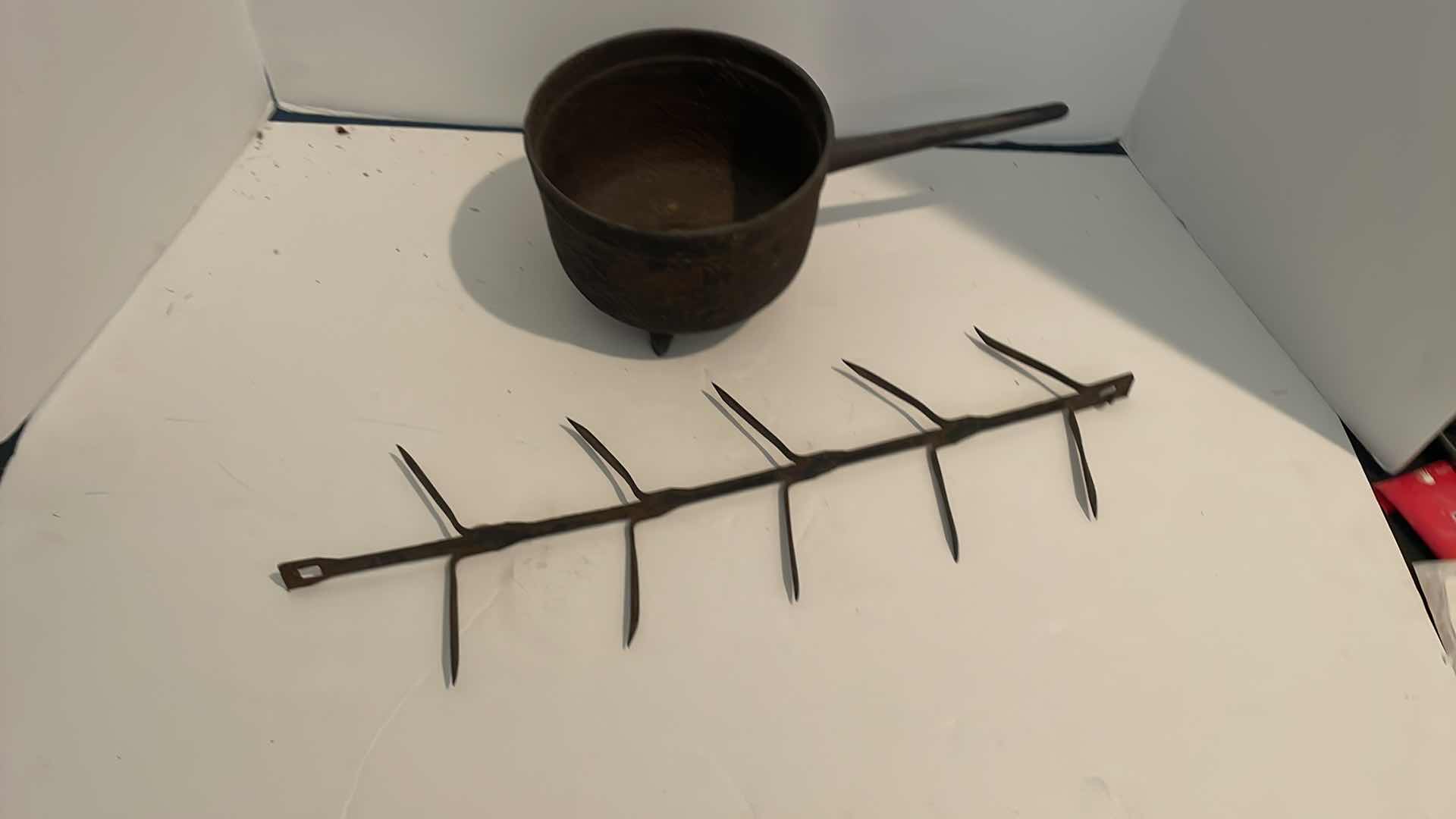 Photo 1 of ANTIQUE CAST IRON PAN 12”  AND HOOK 19”