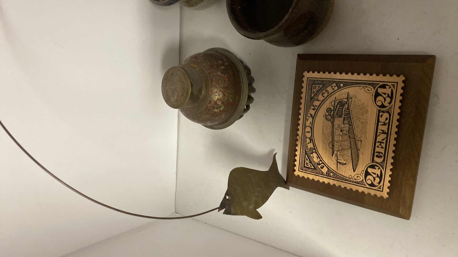 Photo 1 of METAL FISHING STATUE 14” AND PLAQUES 