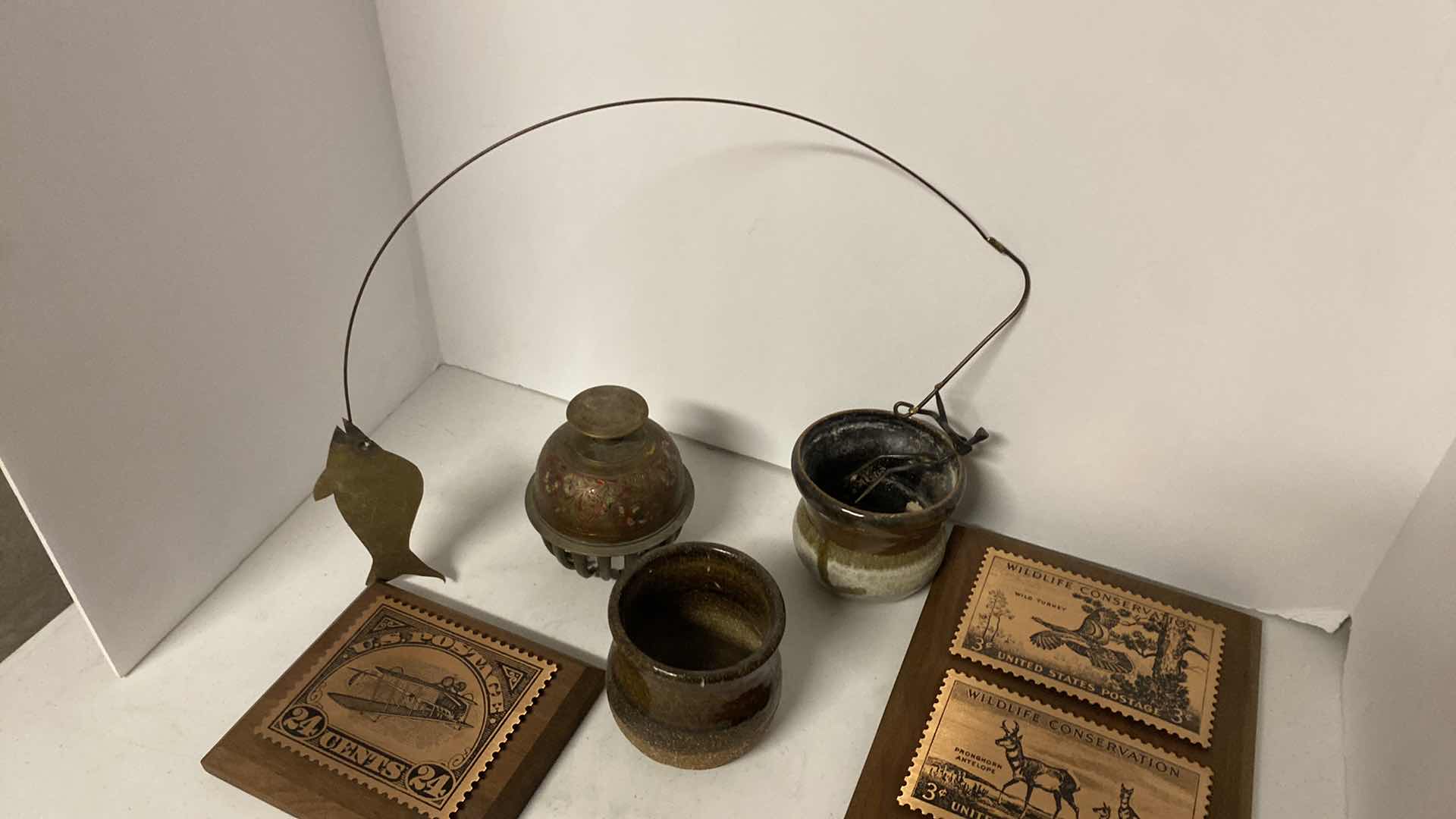 Photo 1 of METAL FISHING STATUE 14” AND PLAQUES 