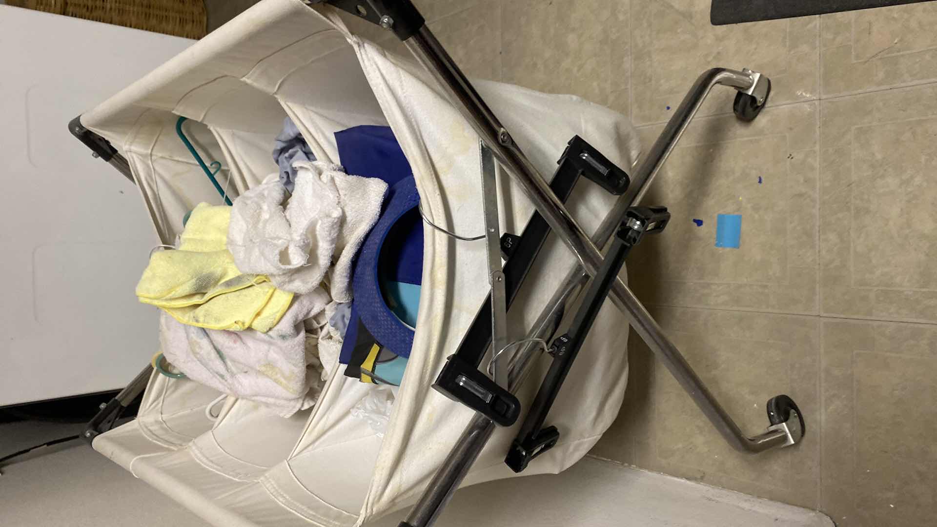 Photo 1 of LAUNDRY HAMPER WITH CONTENTS