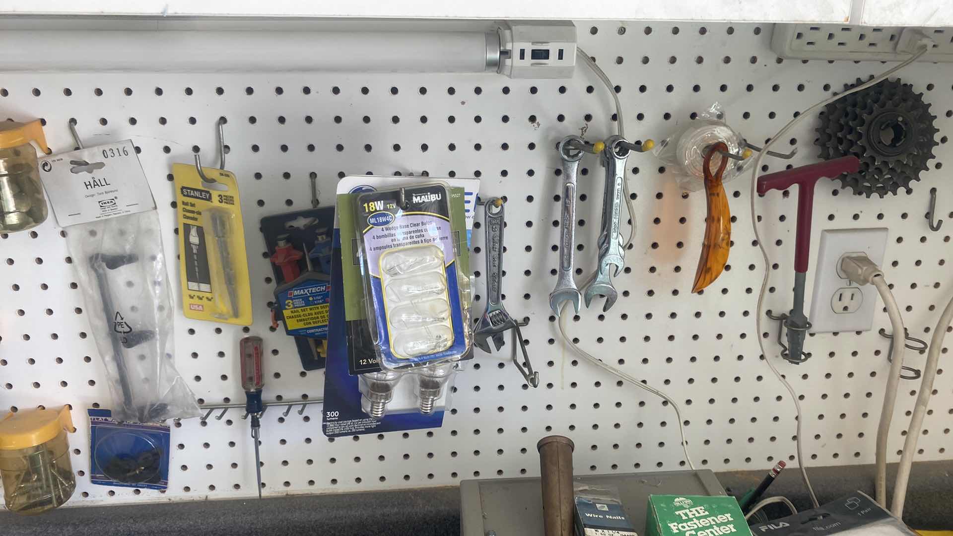 Photo 1 of GARAGE HAND TOOLS & HARDWARE ON PEG BOARD, HOOKS INCLUDED (pegboard not included)