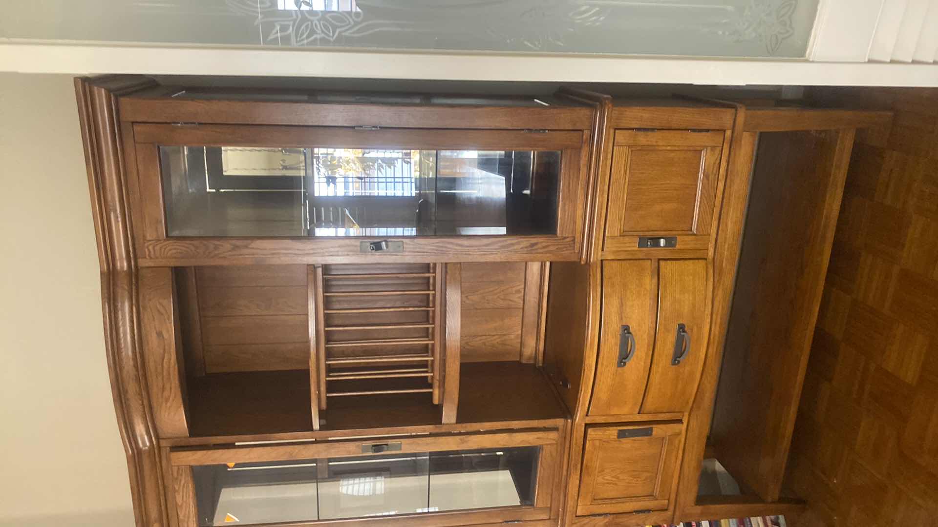 Photo 1 of OAK SIDEBOARD WITH BEVELED GLASS DOORS & SHELF ON BOTTOM 56“ x 18“ H84”