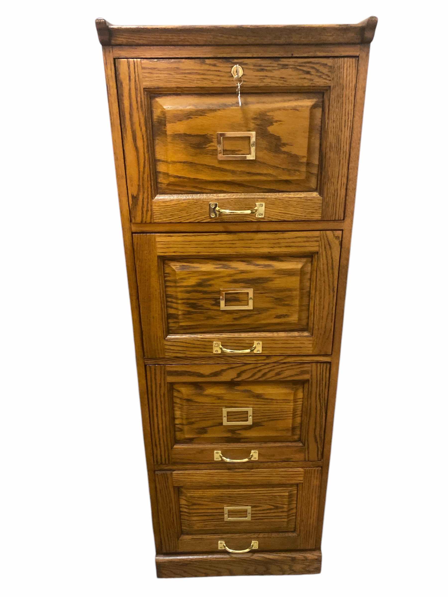Photo 1 of OAK 4 DRAWER FILE CABINET 18“ x 24“ H 54”