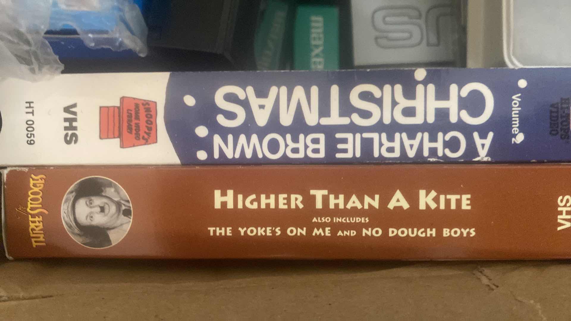 Photo 1 of BOX OF VHS MOVIES & BOOKS