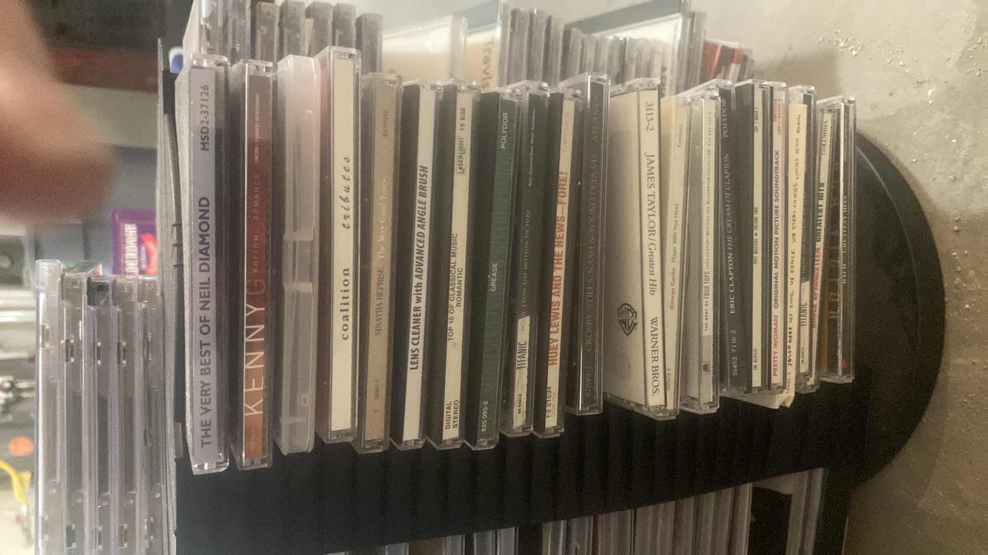 Photo 4 of CD’s ON STORAGE RACK