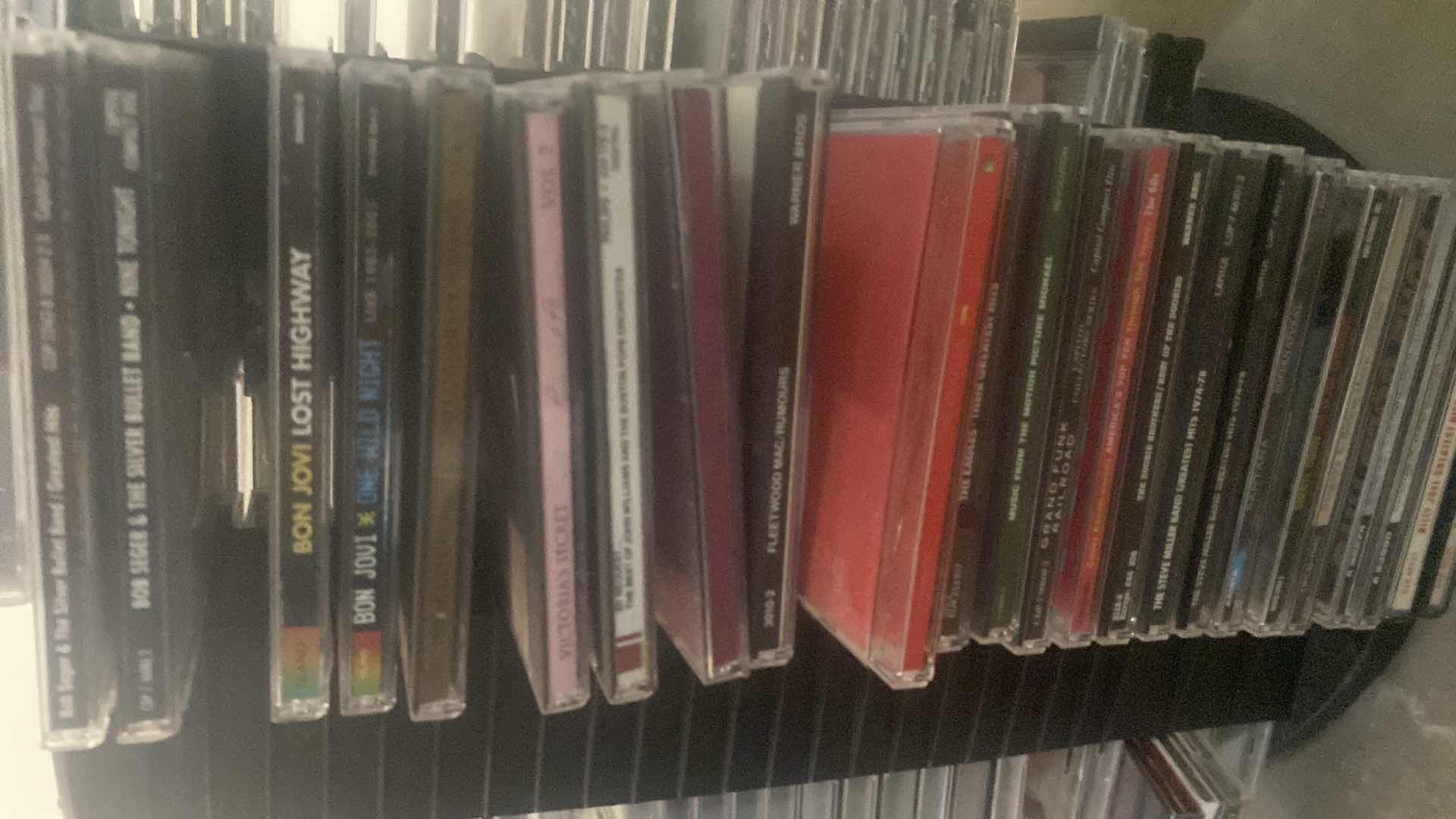 Photo 2 of CD’s ON STORAGE RACK