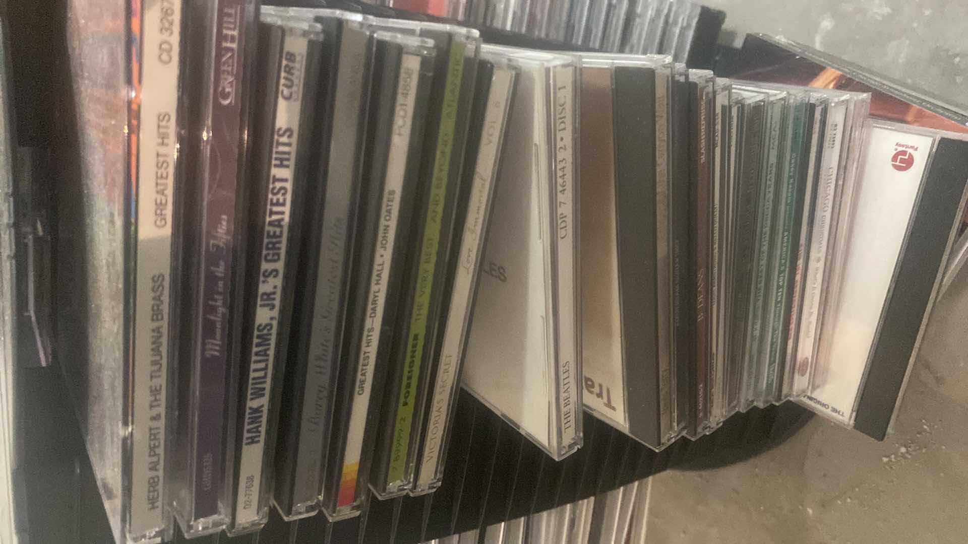 Photo 3 of CD’s ON STORAGE RACK