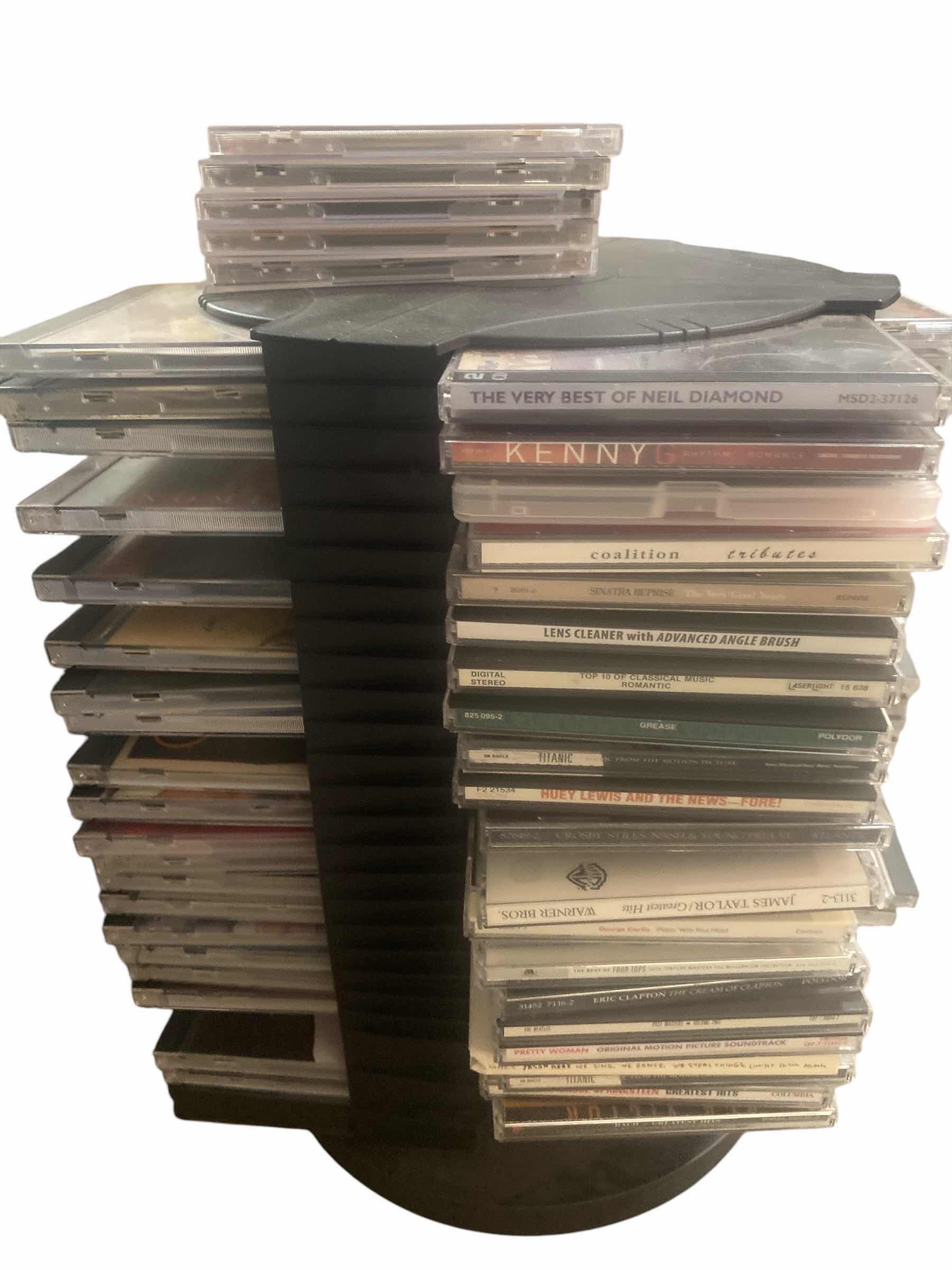 Photo 1 of CD’s ON STORAGE RACK