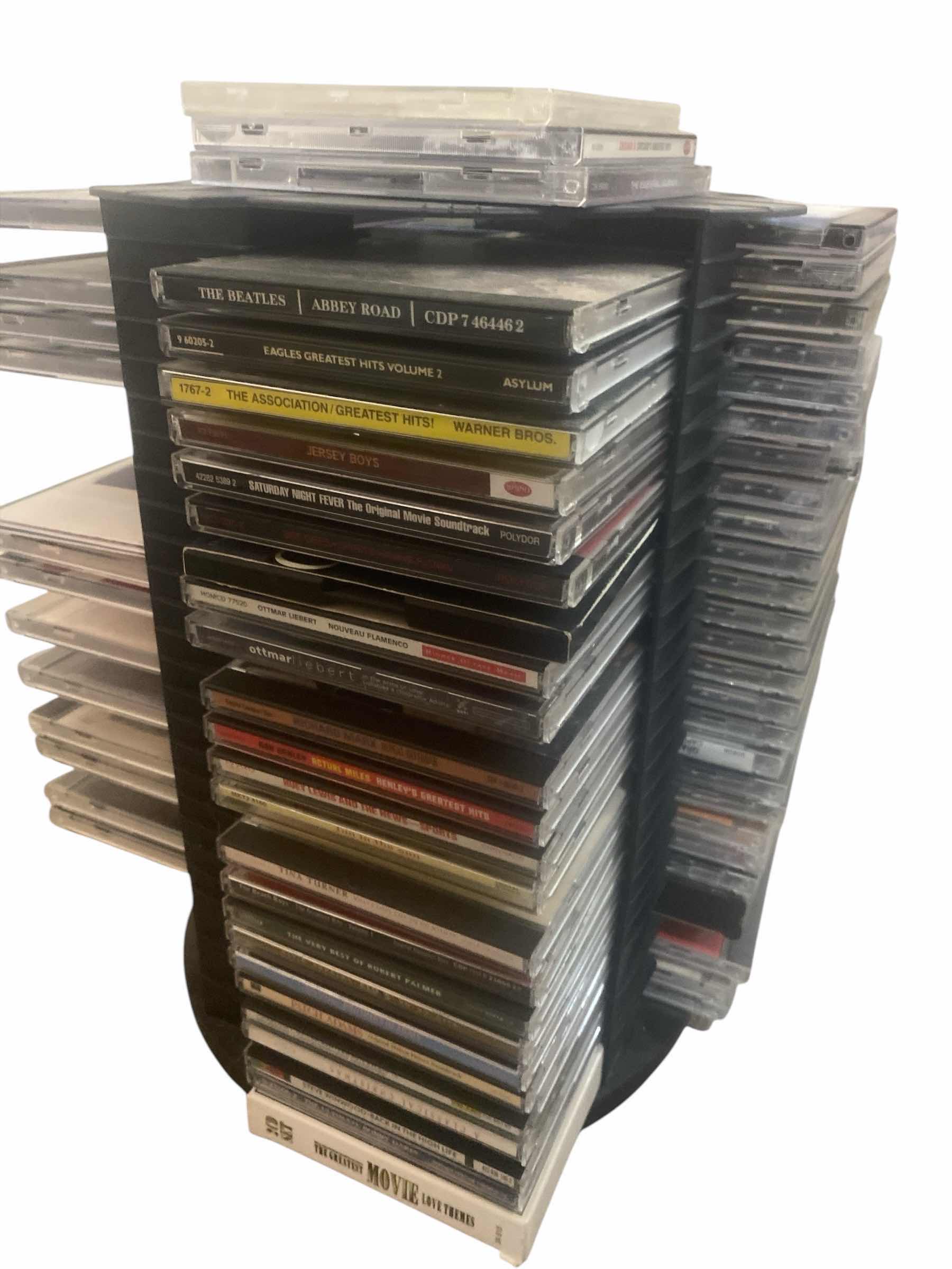 Photo 1 of CD’s ON STORAGE RACK