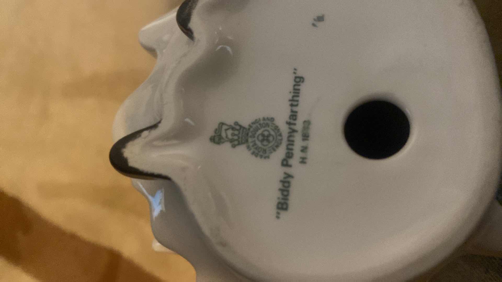 Photo 1 of ROYAL DOULTON BIDDY PENNYFARTHING FIGURINE H8 1/2”