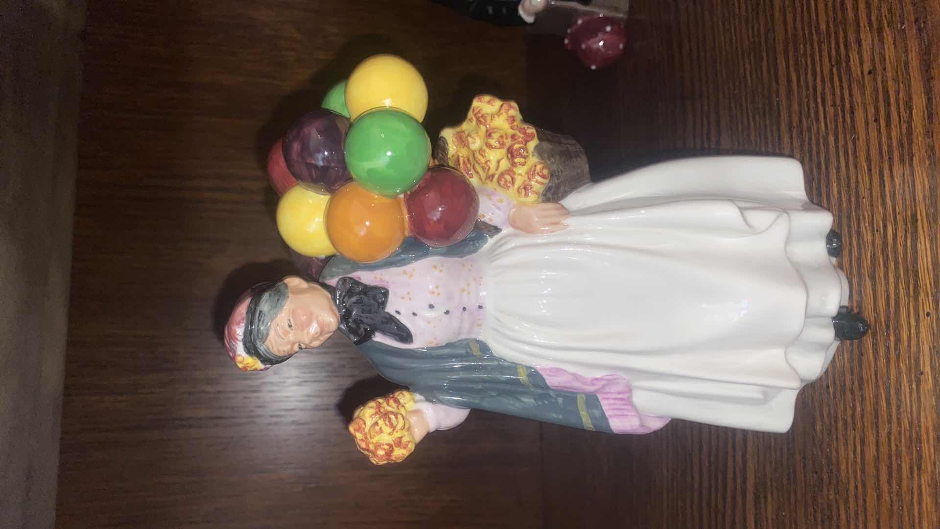 Photo 1 of ROYAL DOULTON BIDDY PENNYFARTHING FIGURINE H8 1/2”