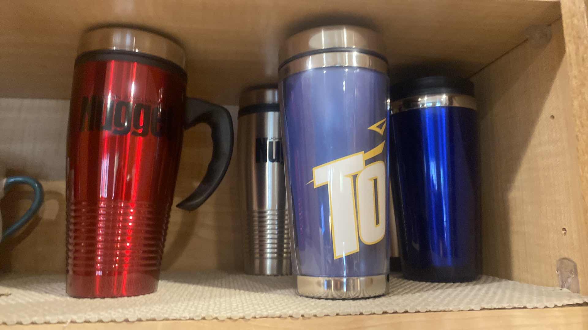 Photo 1 of CONTENTS OF CABINET - GLASSES COFFEE CUPS TRAVEL CUPS