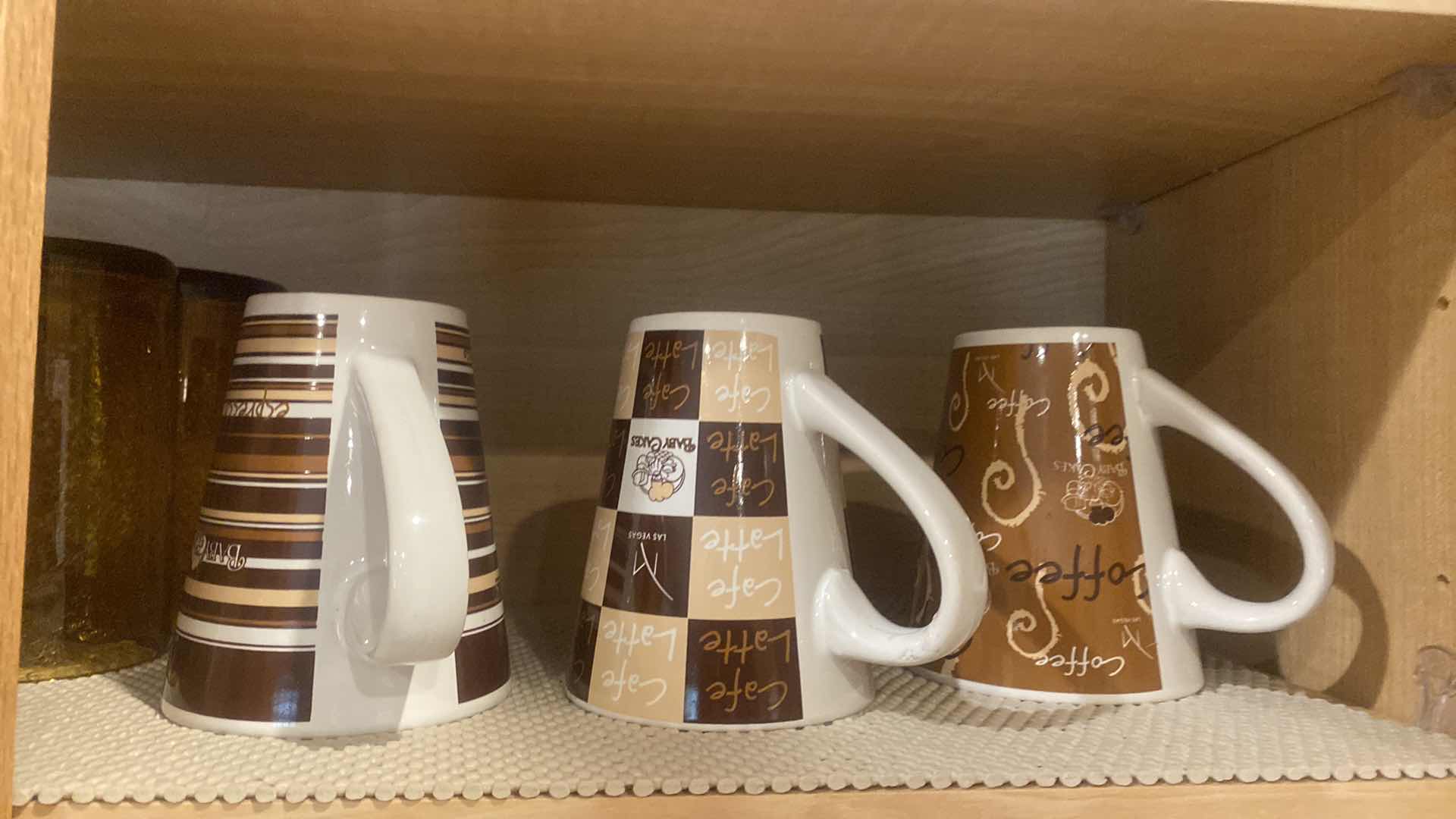 Photo 1 of CONTENTS OF CABINET - GLASSES COFFEE CUPS TRAVEL CUPS