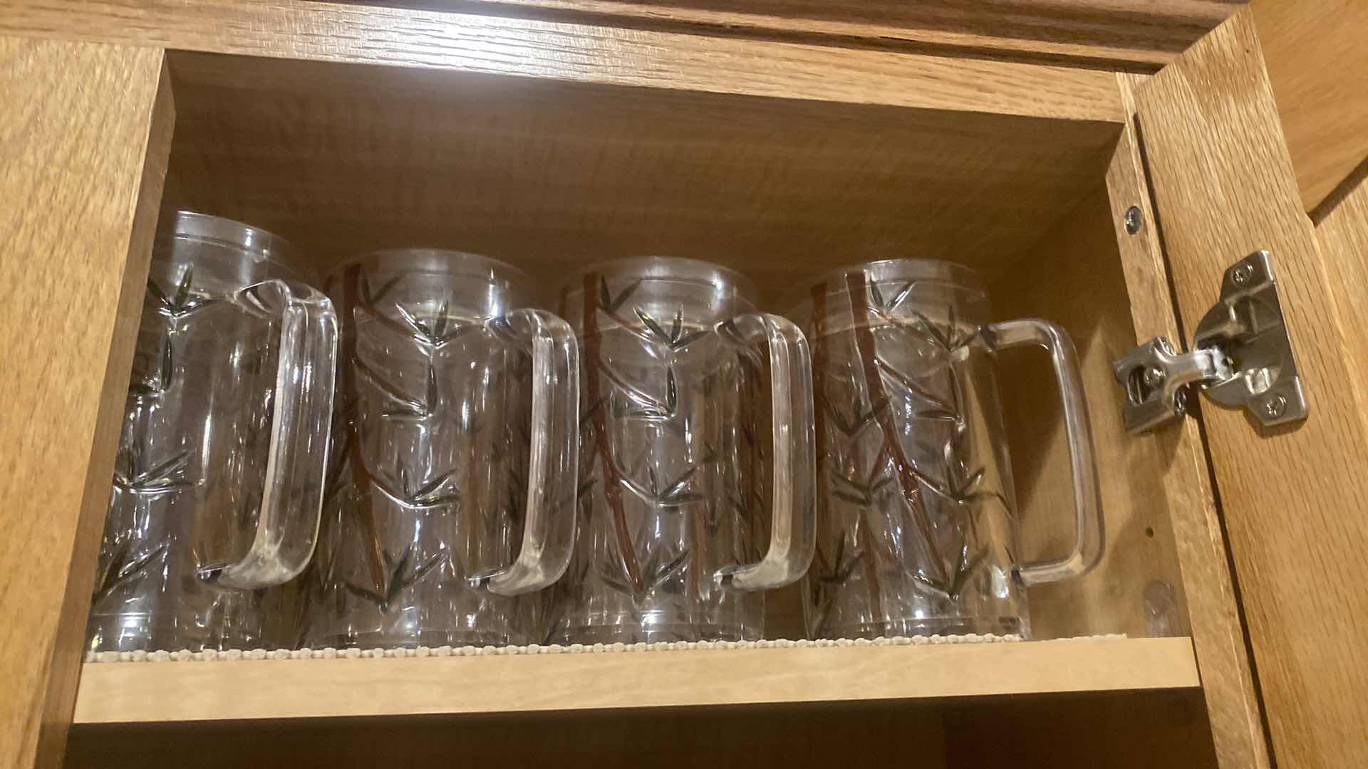 Photo 1 of CONTENTS OF KITCHEN CABINET - GLASS MUGS  HOLIDAY SERVEWARE